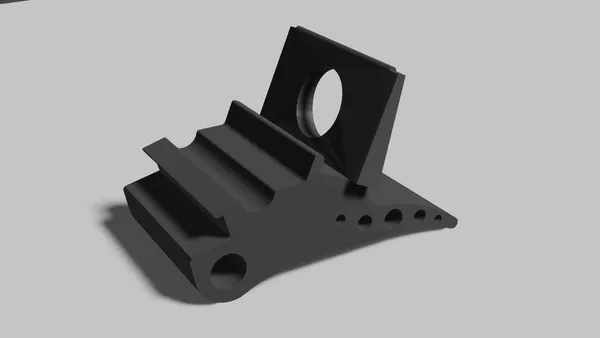 Render de una pieza negra de ABS con ranuras y perforaciones, ejemplo de uso del material