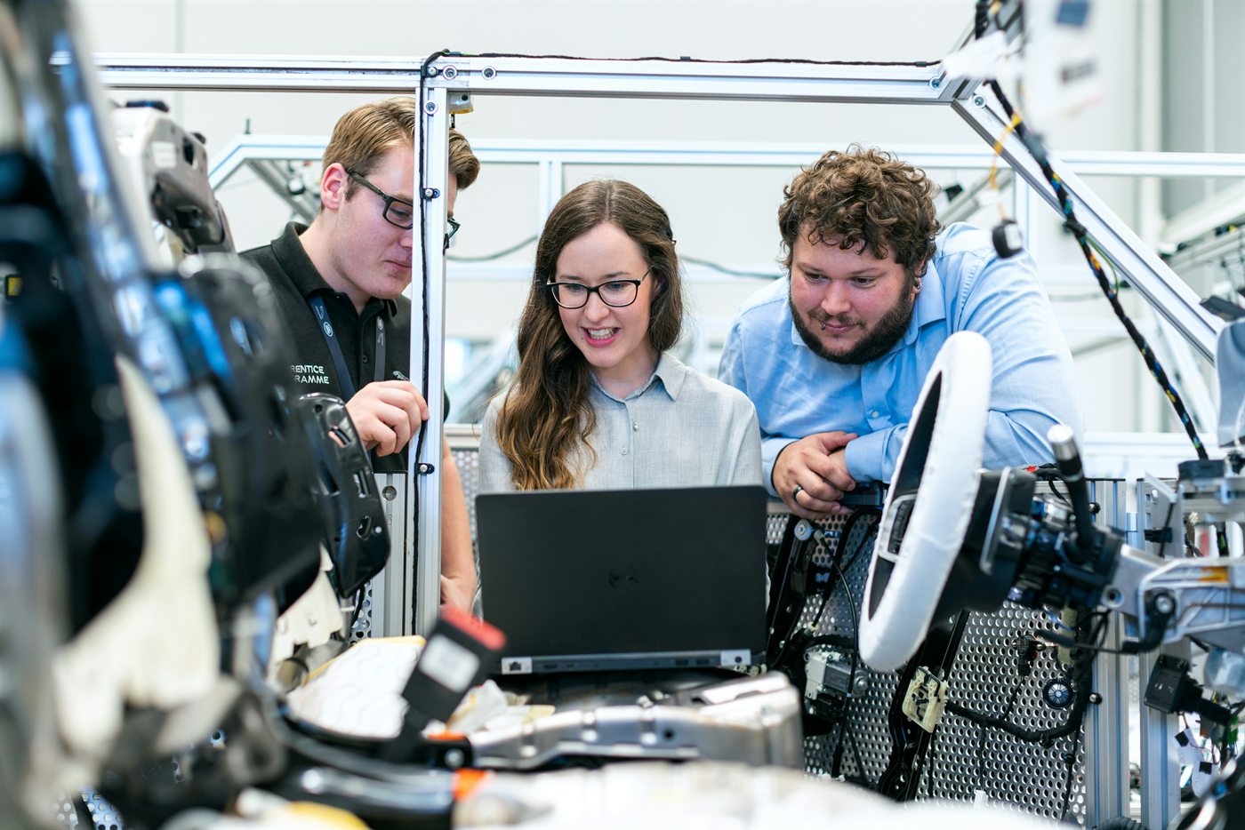 Engineers working together on a prototype in a development laboratory