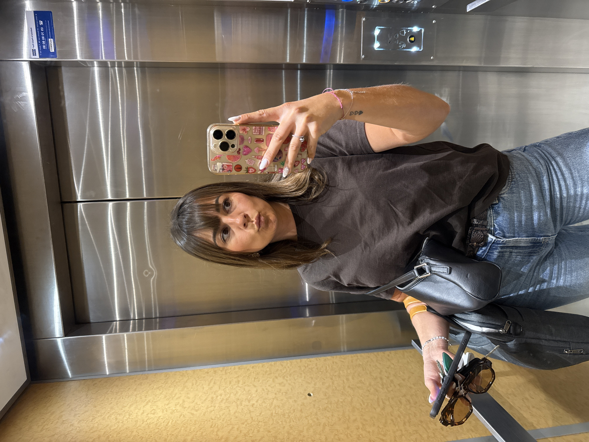 Woman takes elevator selfie in Nice, France