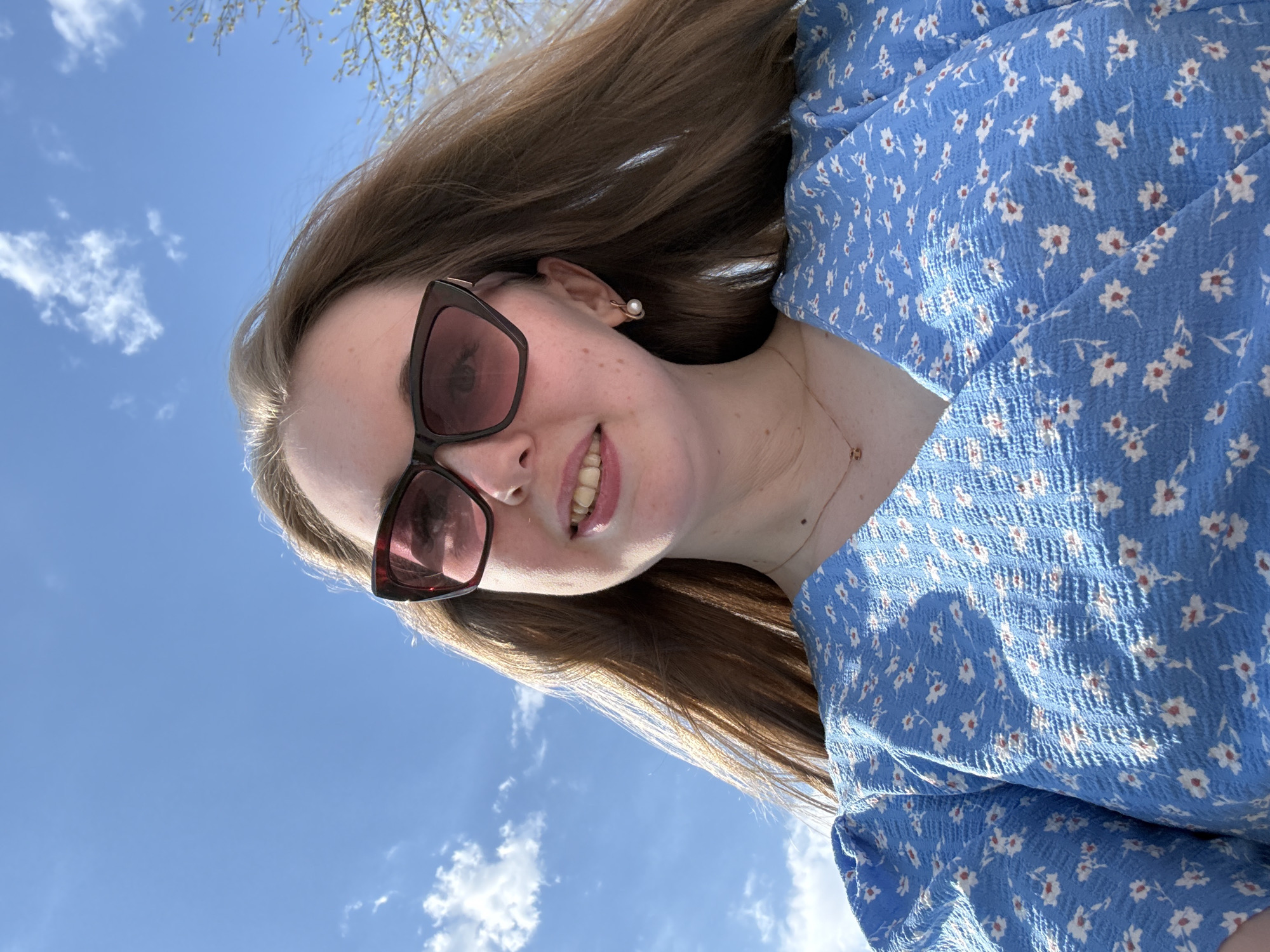 Woman spends morning in urban park, multiple selfies captured
