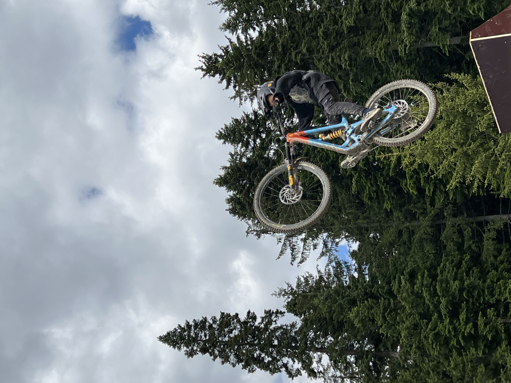 Mountain bikers perform aerial stunts near Samokov, Bulgaria