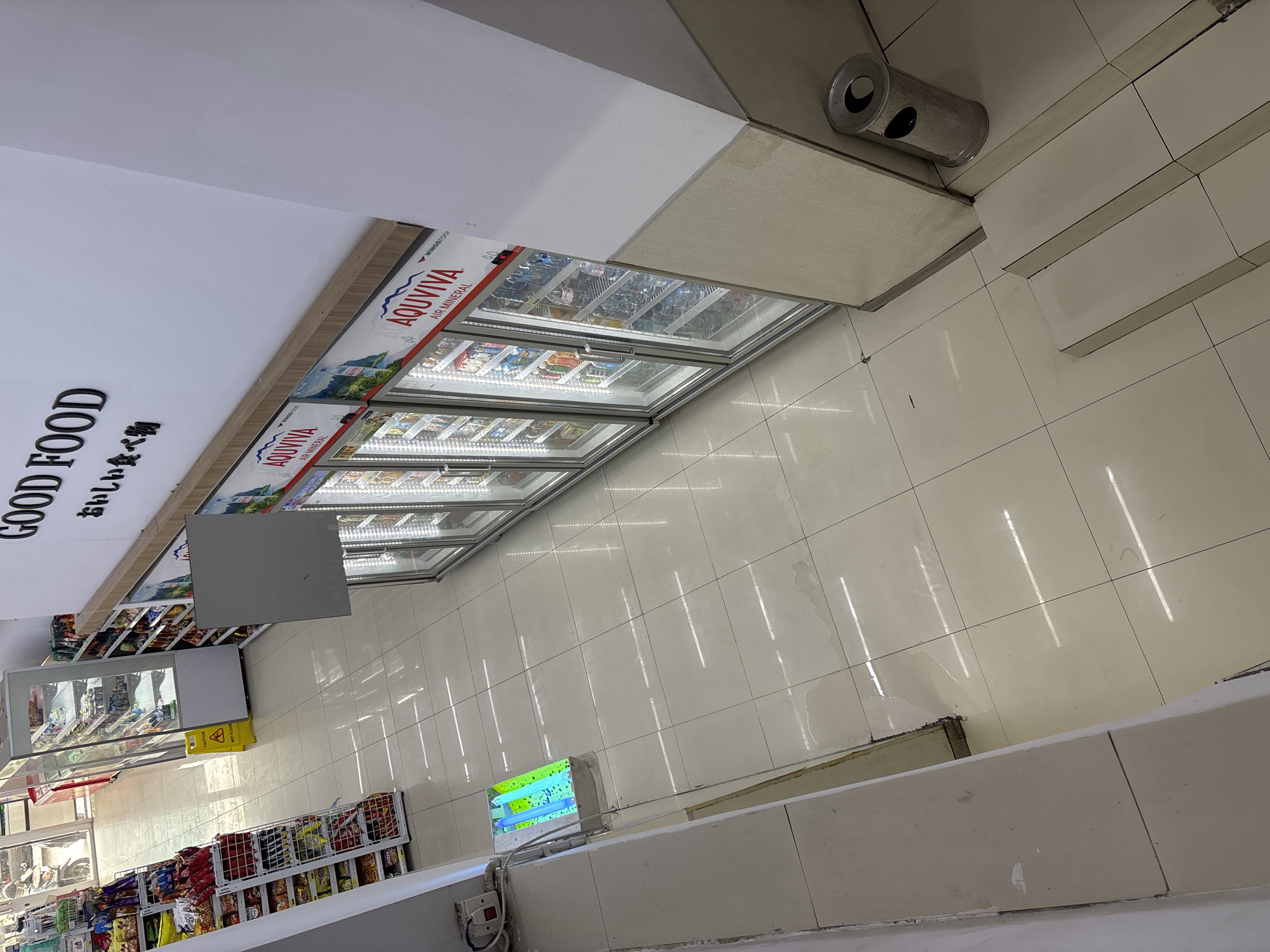 Late-night grocery shopping documented in West Jakarta convenience store