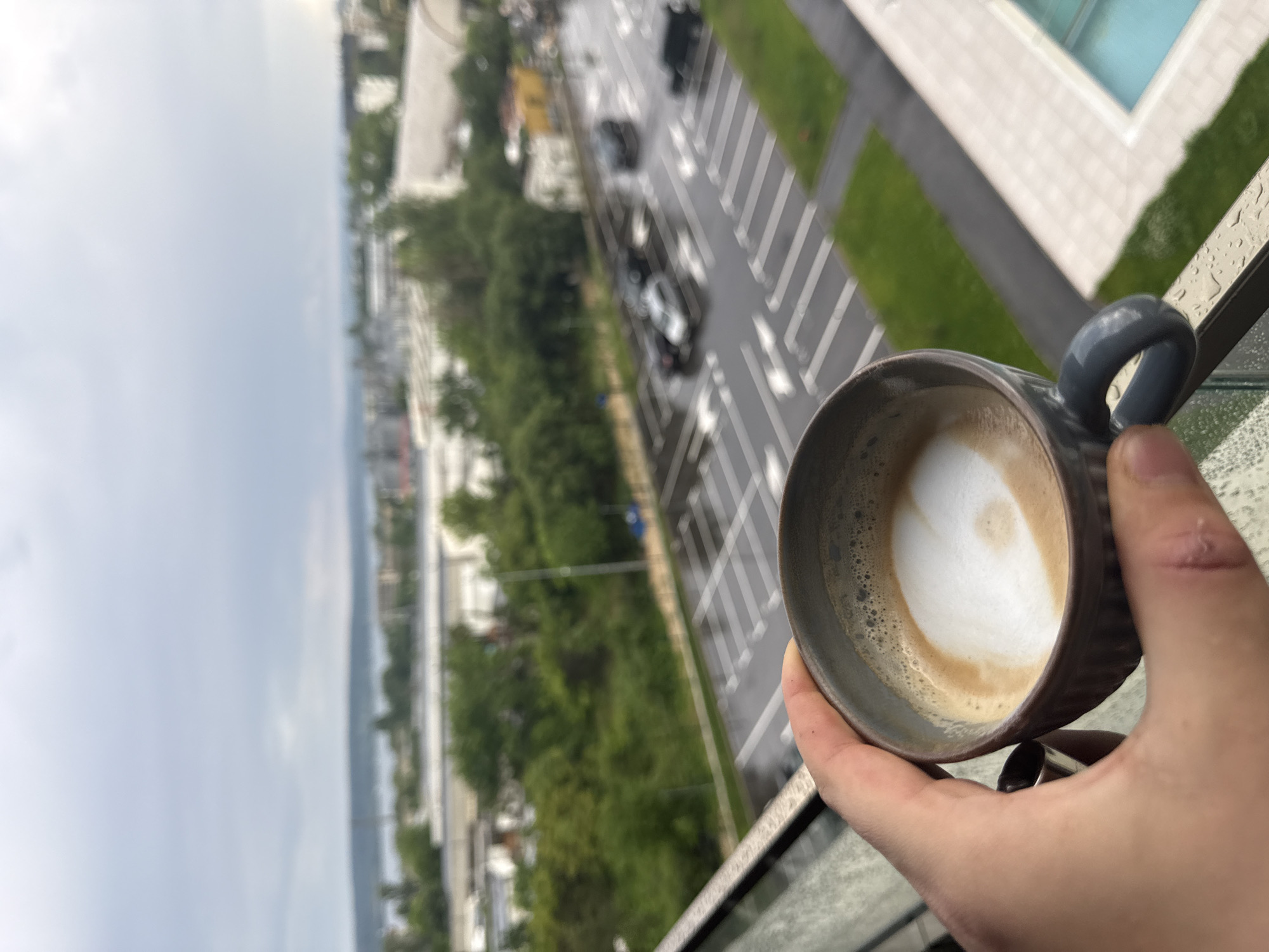 Coffee break on Varna balcony during overcast afternoon