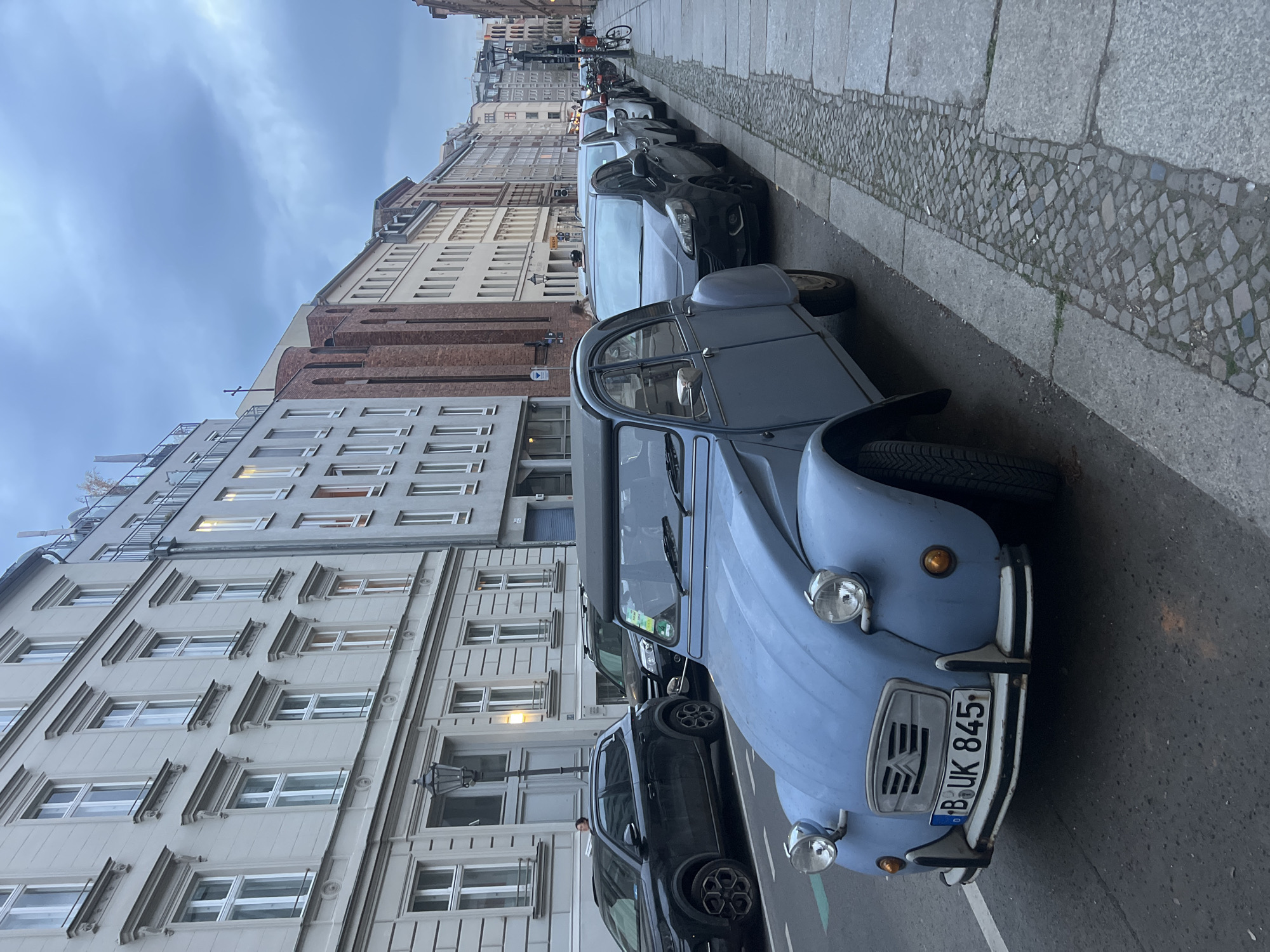 Evening street life documented across central Berlin neighborhoods