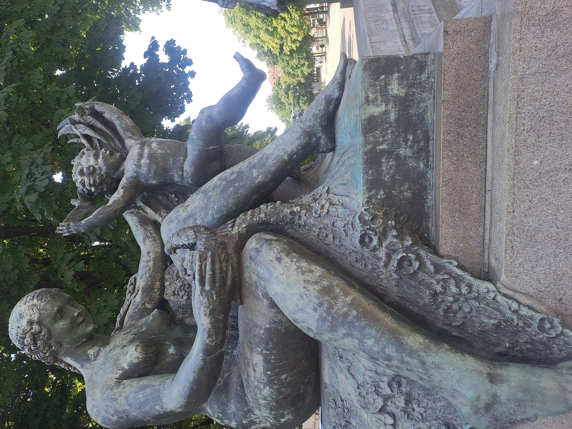 Park sculpture and street life near Parco del Valentino, Turin