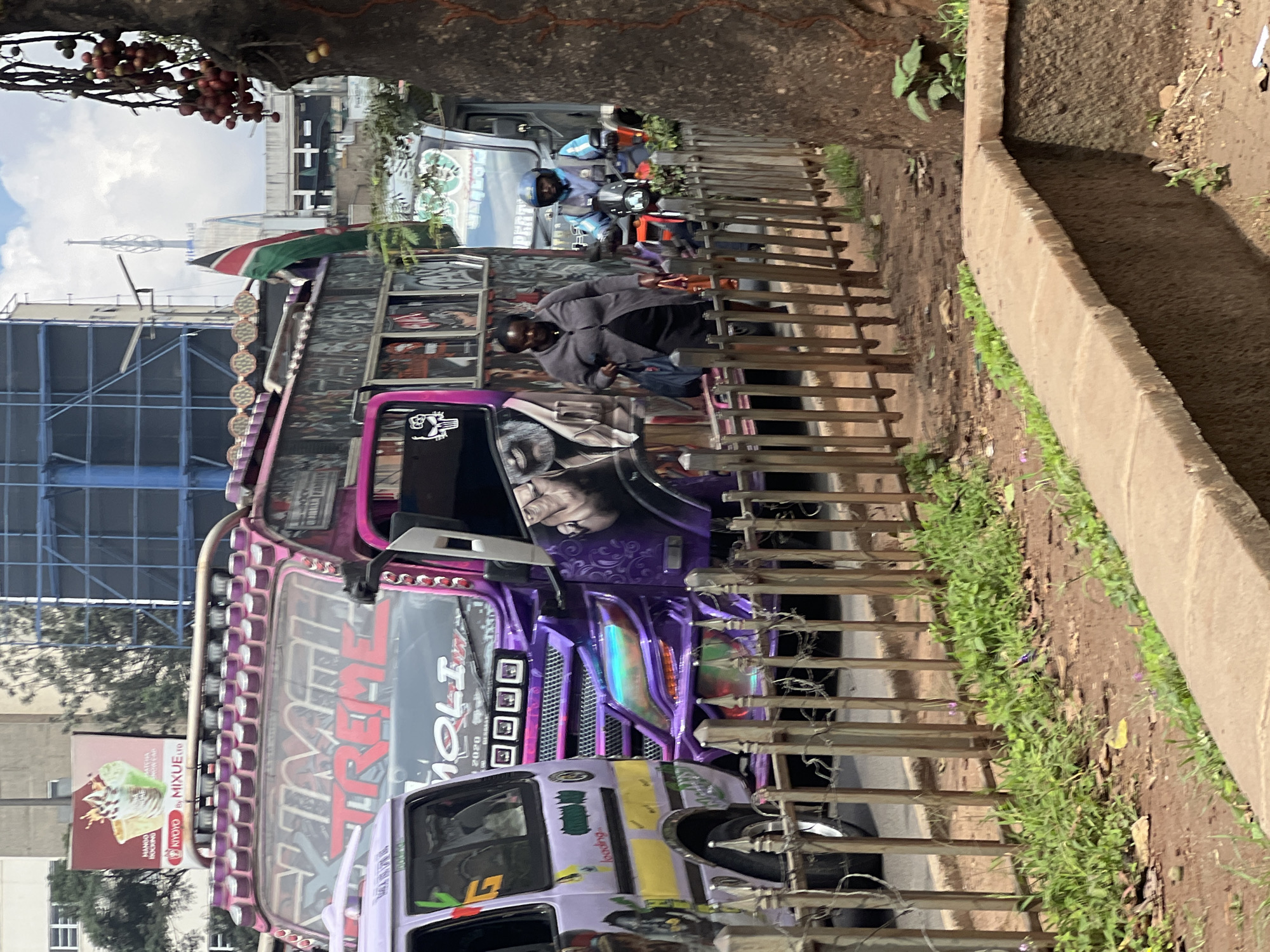 Decorated Purple Matatu Spotted on Busy Nairobi Street