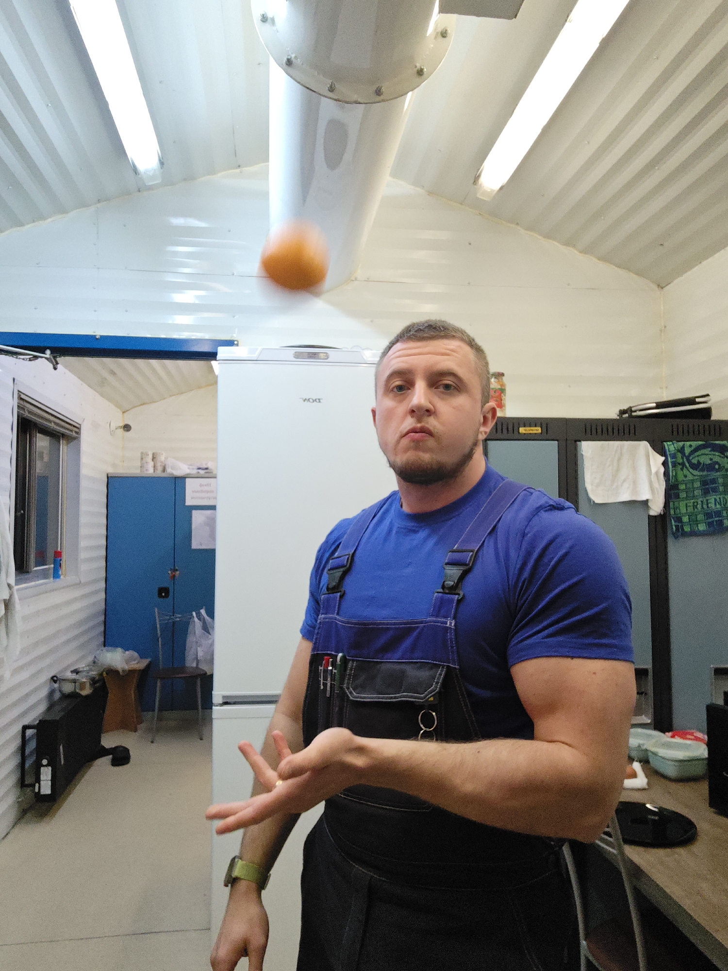Worker prepares home-cooked meal in Russian kitchen