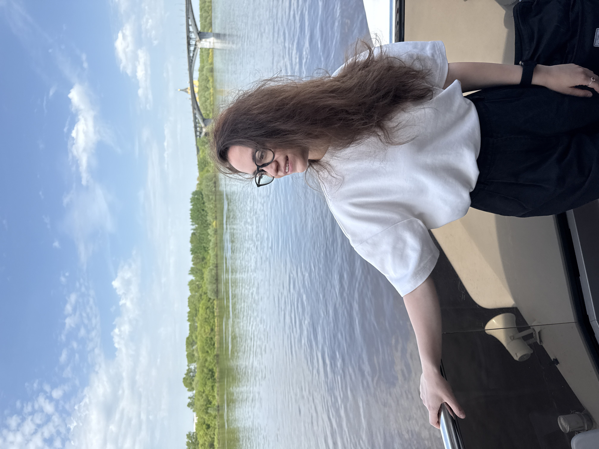 Woman photographed on Volga River boat near Nizhny Novgorod bridge