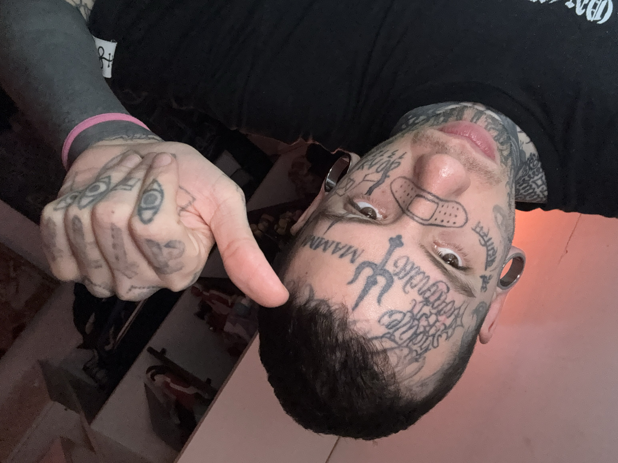 Tattooed man poses for selfies in Buenos Aires