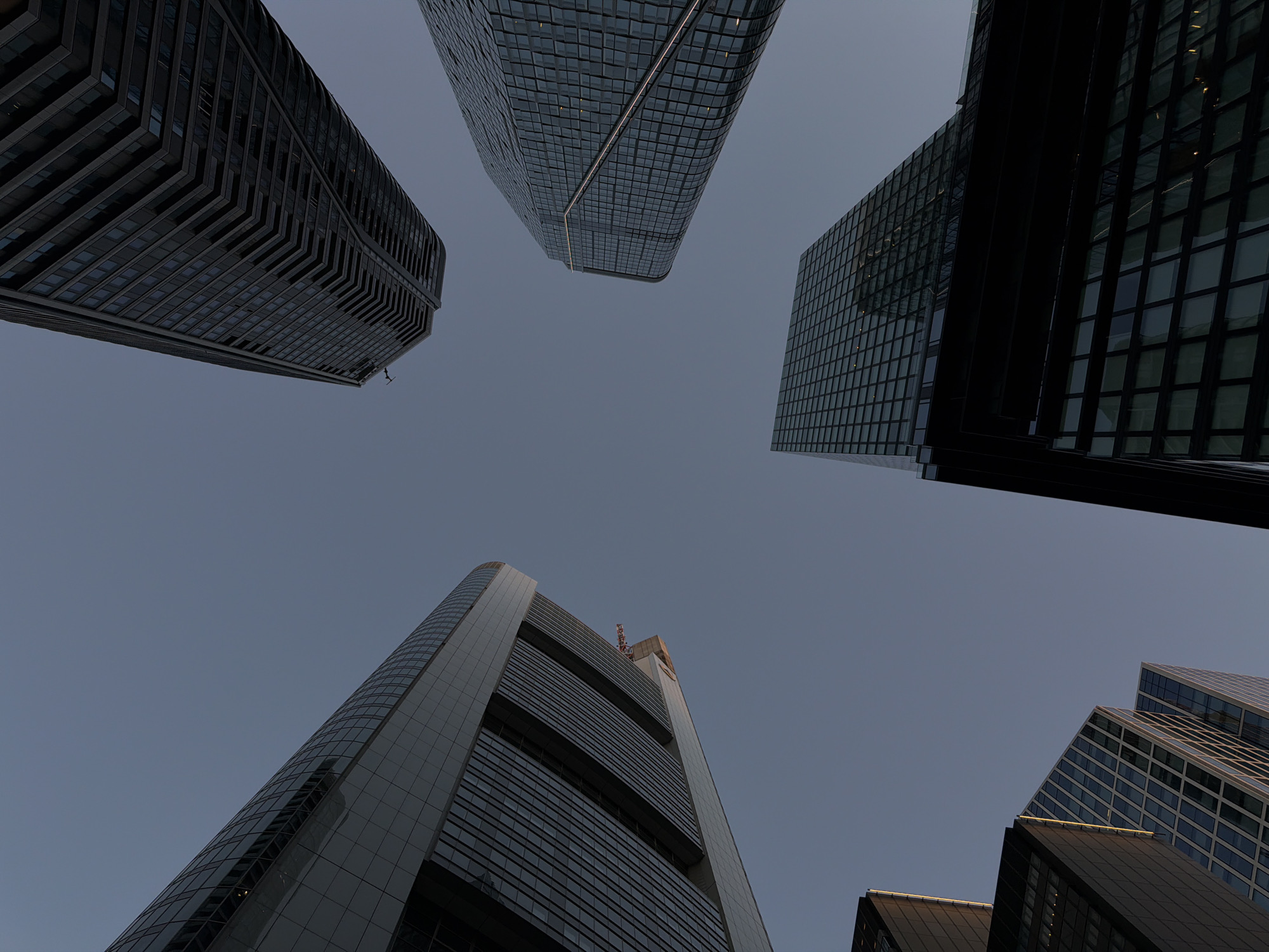 Looking up at Frankfurt's skyline on a clear summer evening