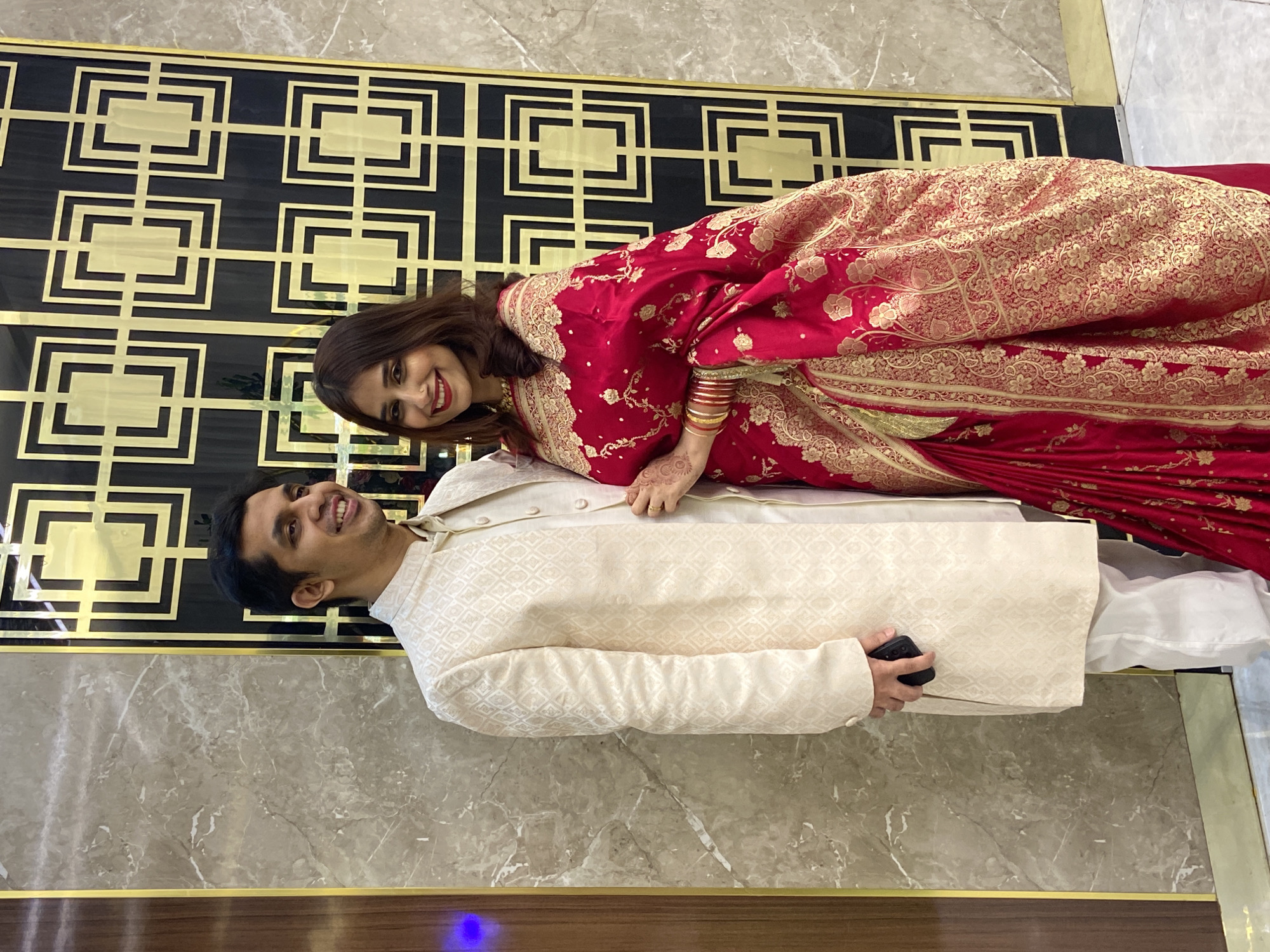Wedding ceremony observed in Dhaka featuring traditional attire