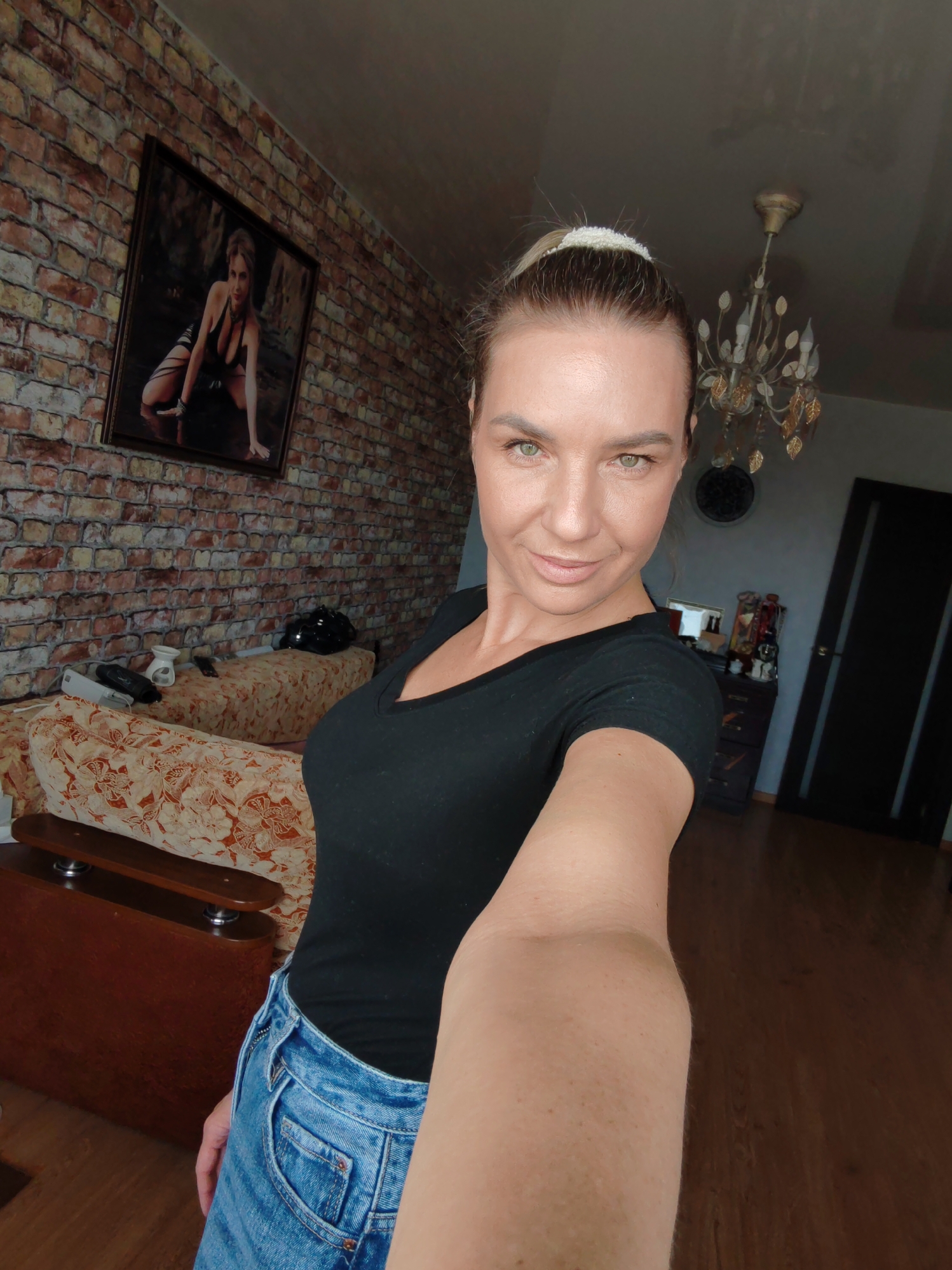 Woman Documents Evening Selfie Session in Kamchatka Home