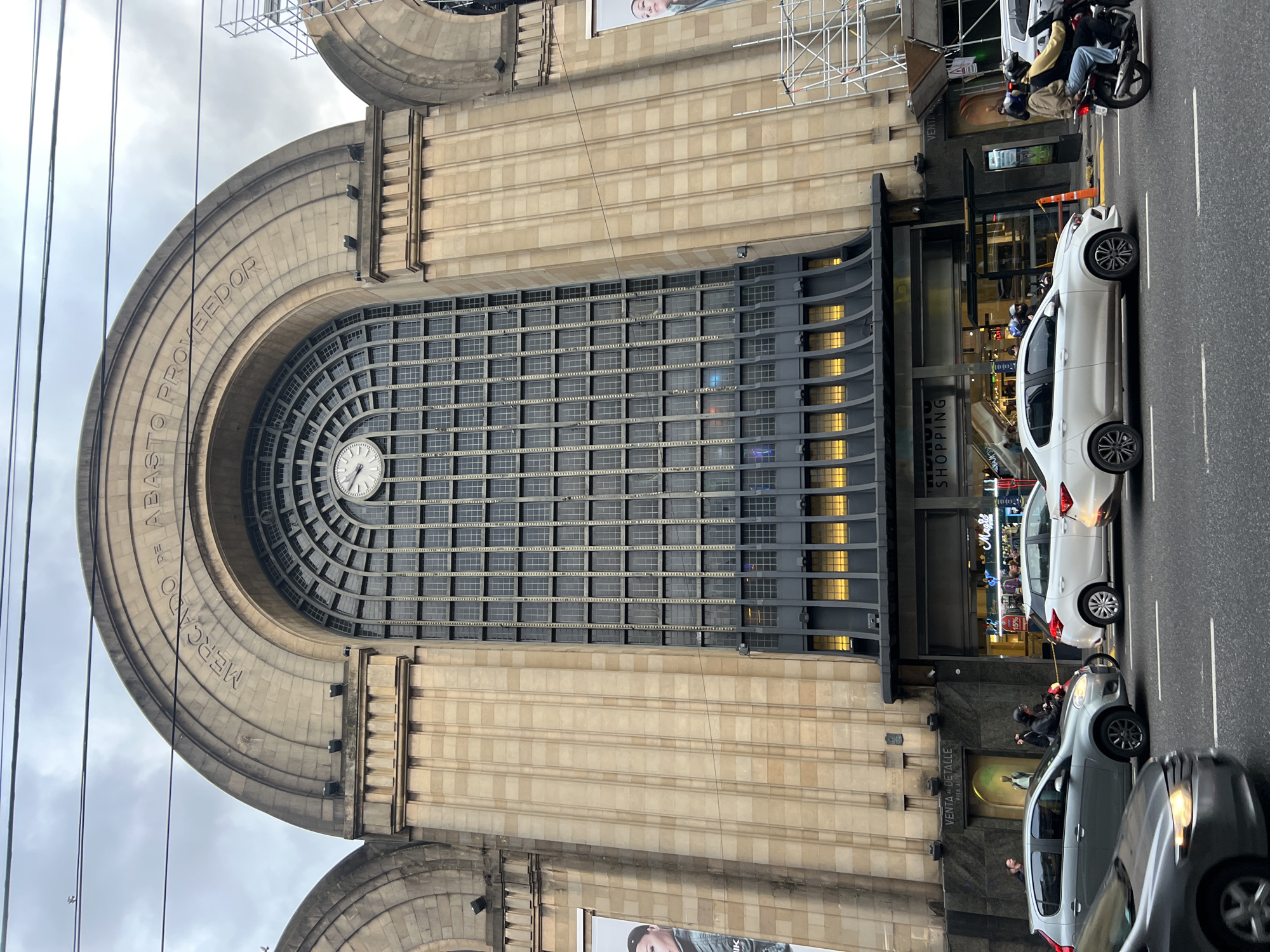 Evening street activity documented around Buenos Aires Abasto Shopping area