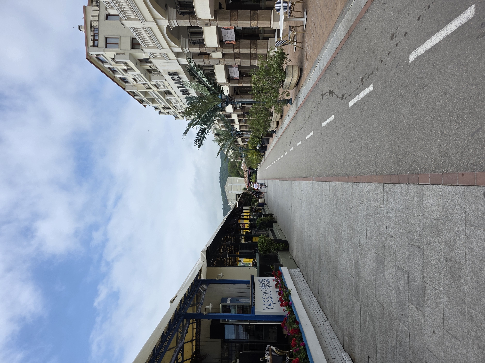 Tourist explores Balchik Bulgaria's promenade, pier, and coastal attractions