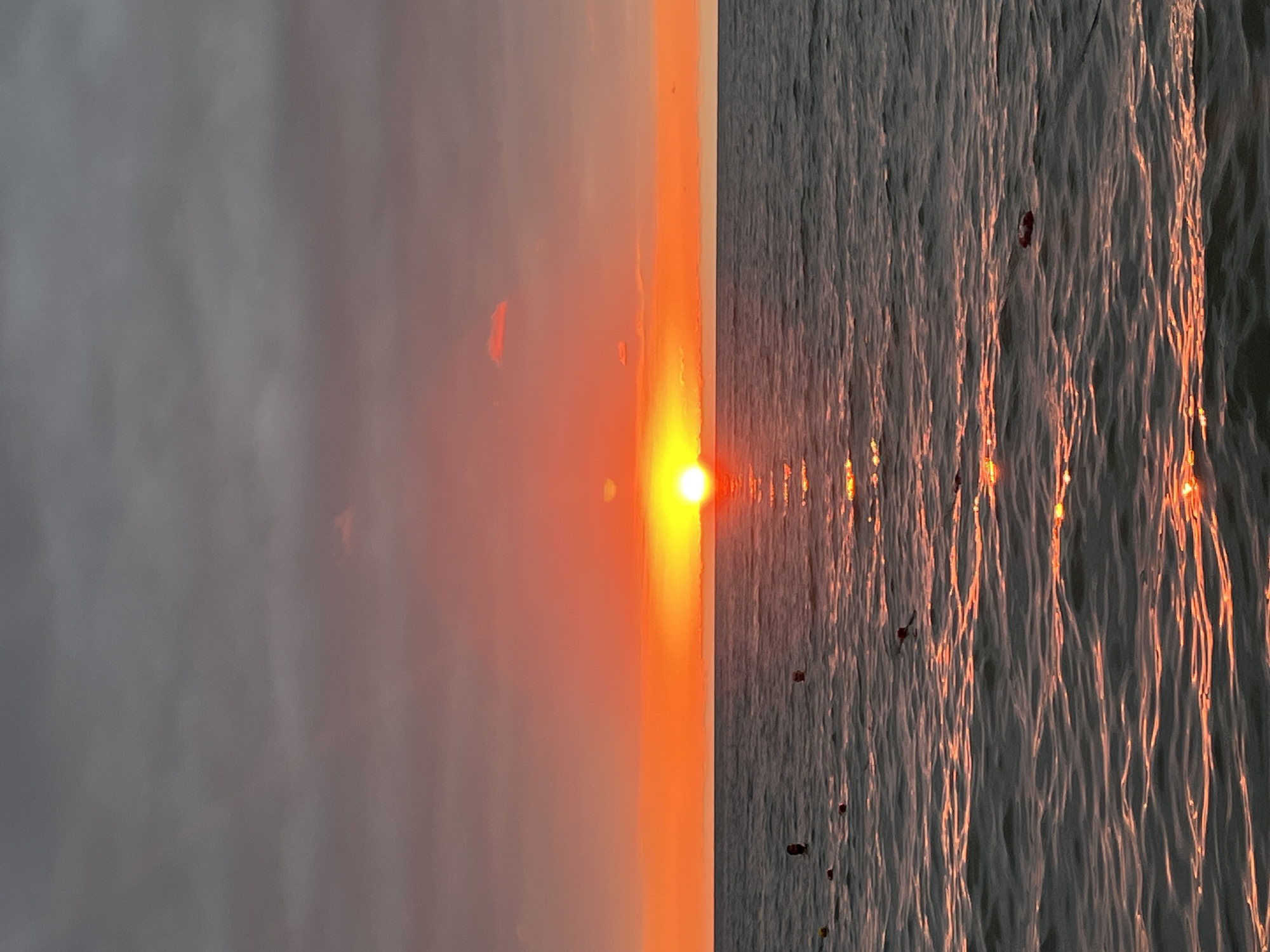 Parasailing and boats at sunset on the Black Sea, Ureki