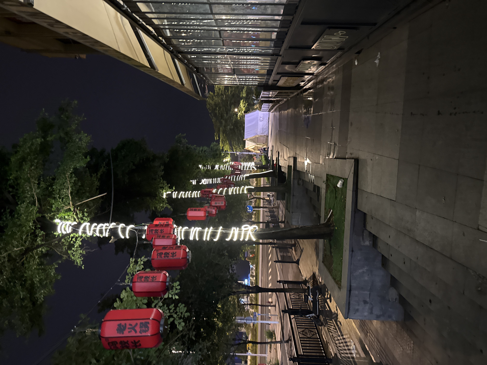Haizhu District street at night, lanterns and local restaurants