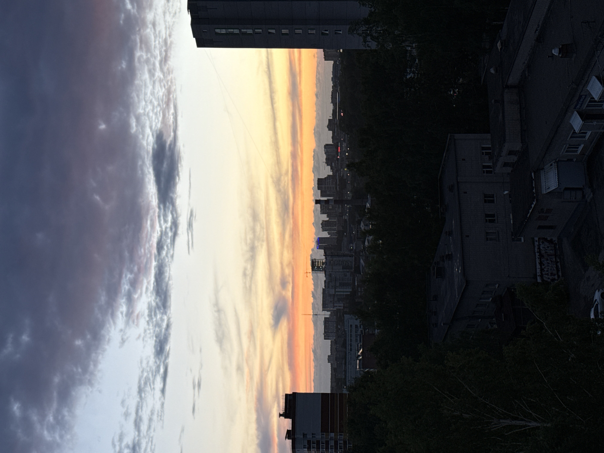 Evening sunset documented across Izhevsk, Russia apartment districts