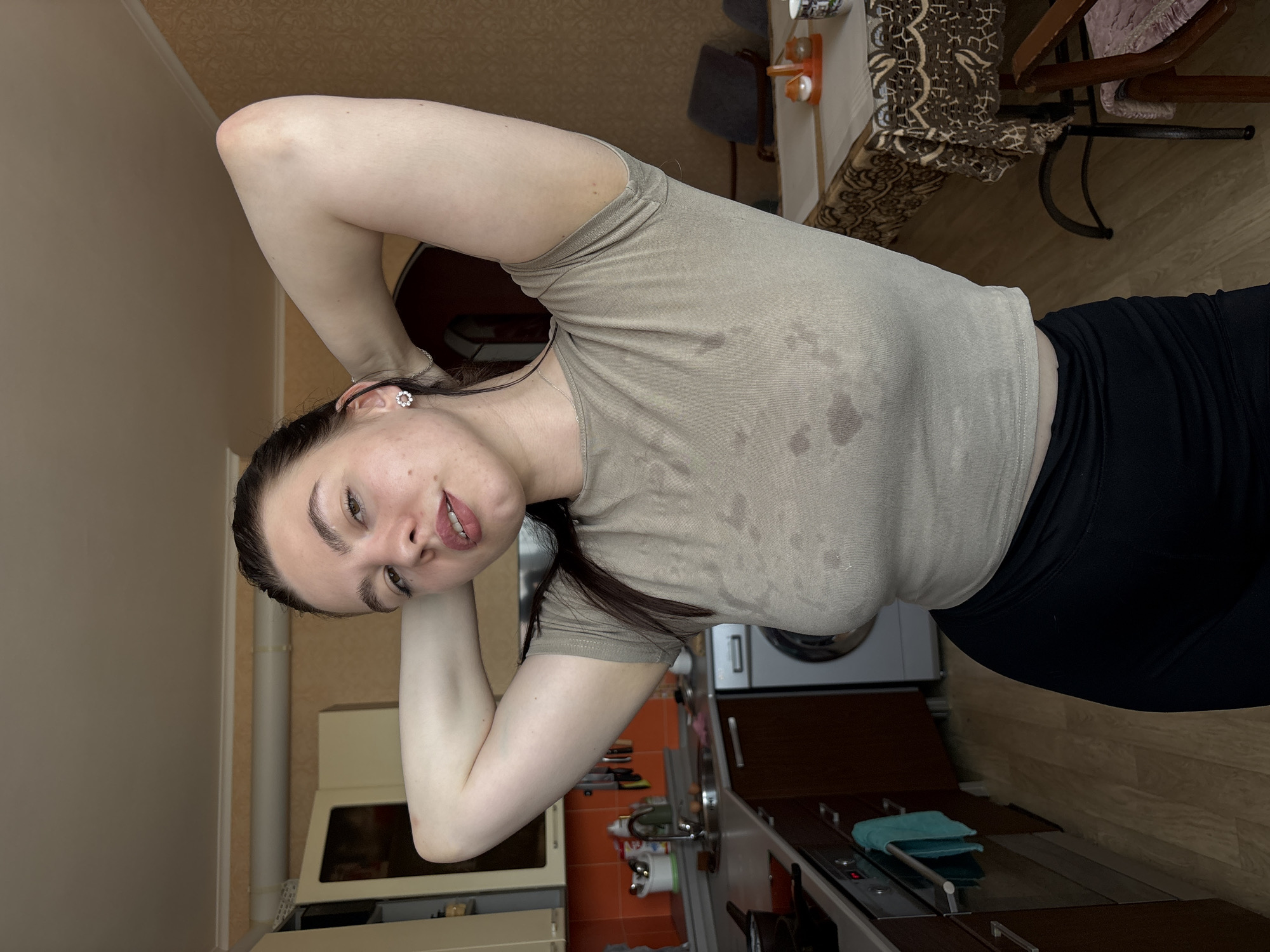 Woman takes casual selfies in Perm apartment