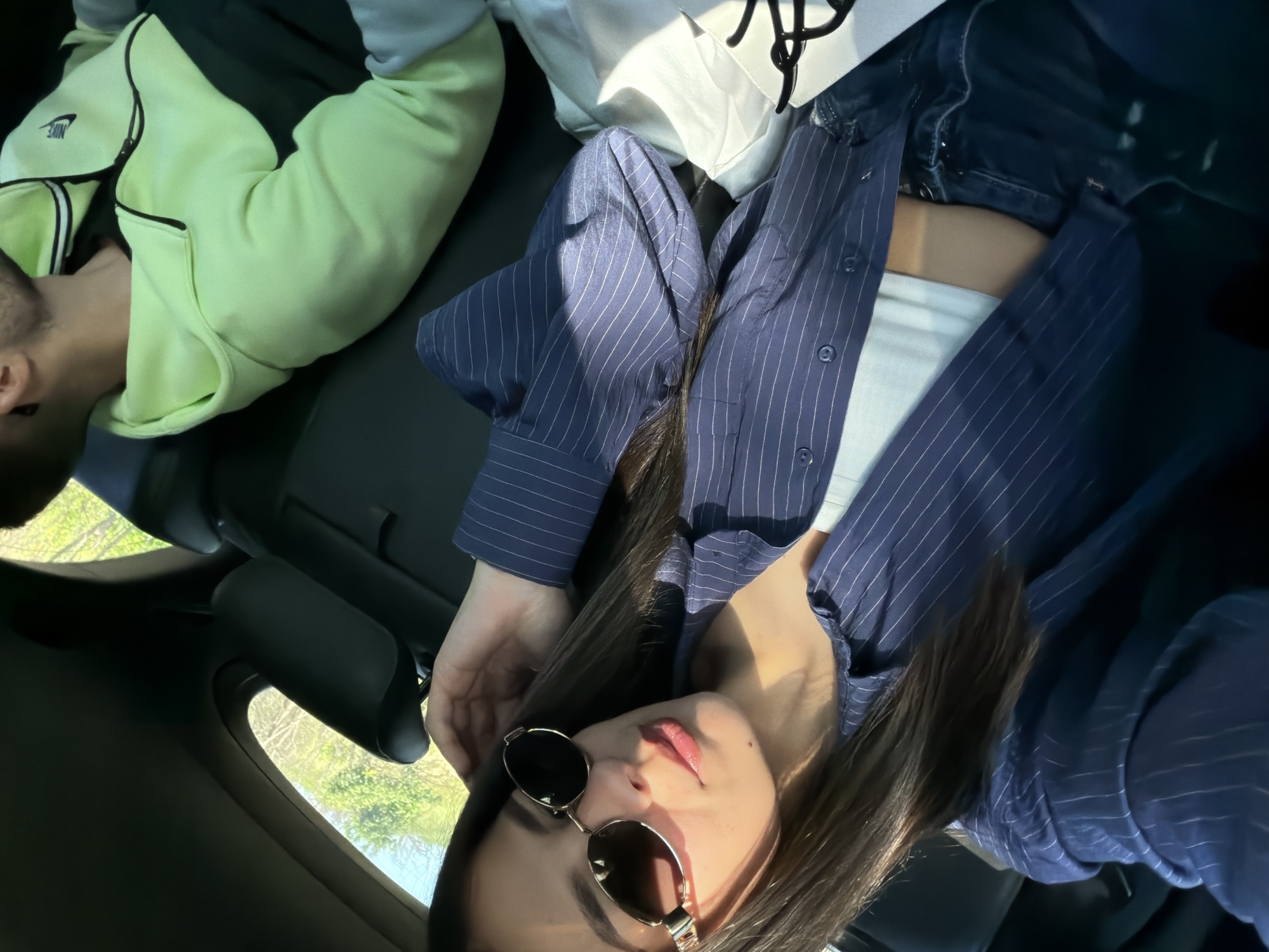 Two people rest inside vehicle in Debelets, Bulgaria