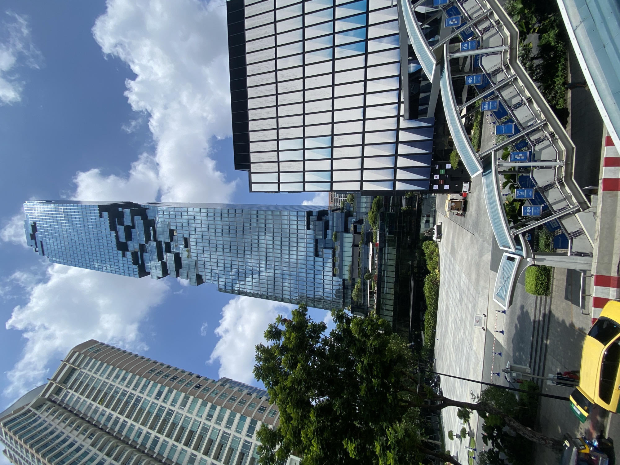 Morning street life documented around Bangkok's MahaNakhon tower