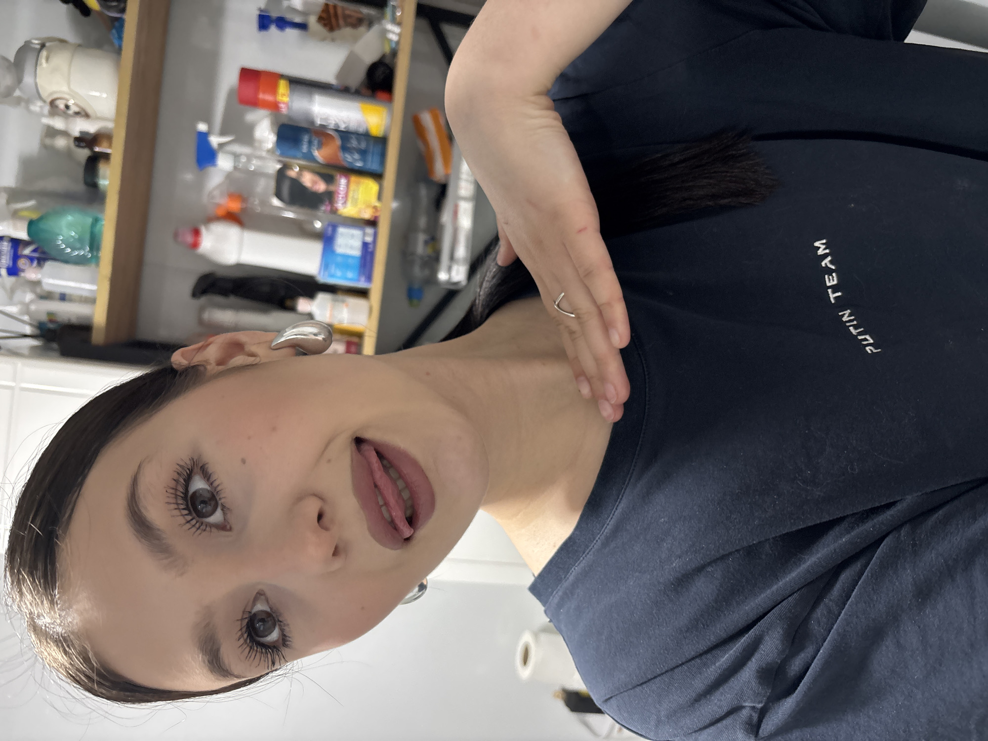 Woman applies makeup in Foki, Russia morning routine