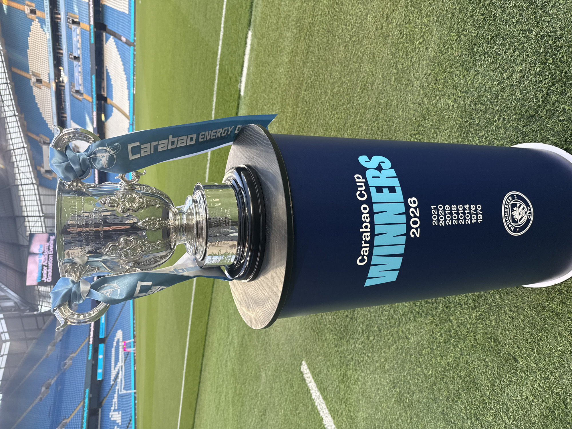 Carabao Cup trophy displayed on Manchester football field