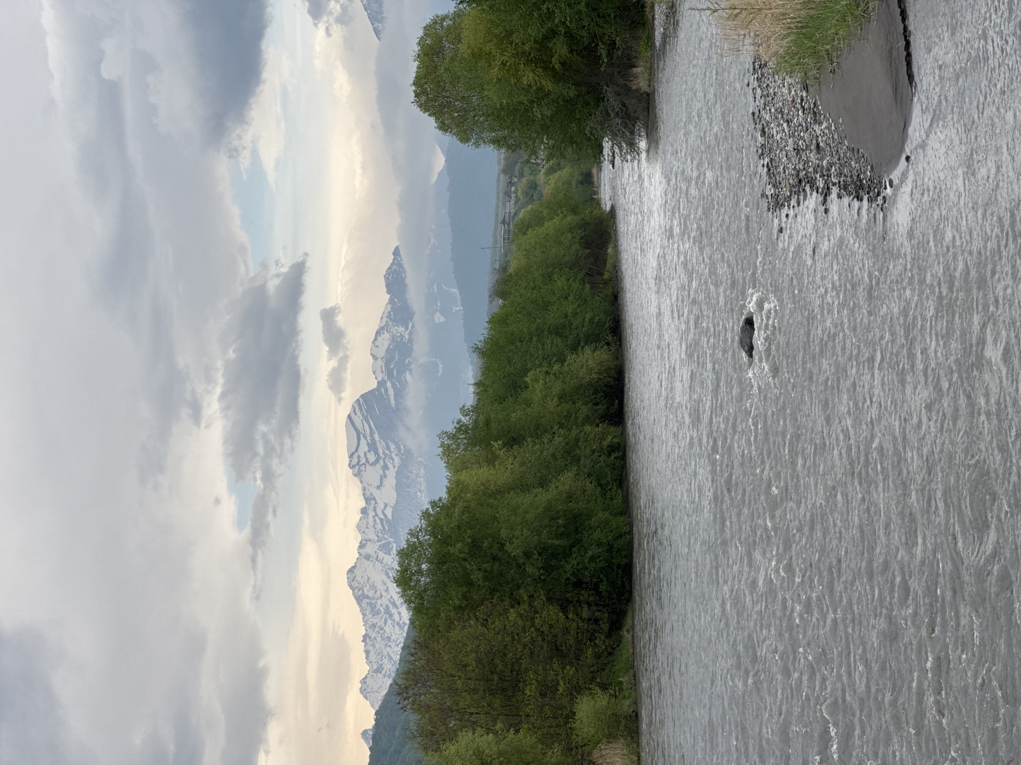 Morning scenes documented in Assinovskaya: river, weathered buildings, radio towers