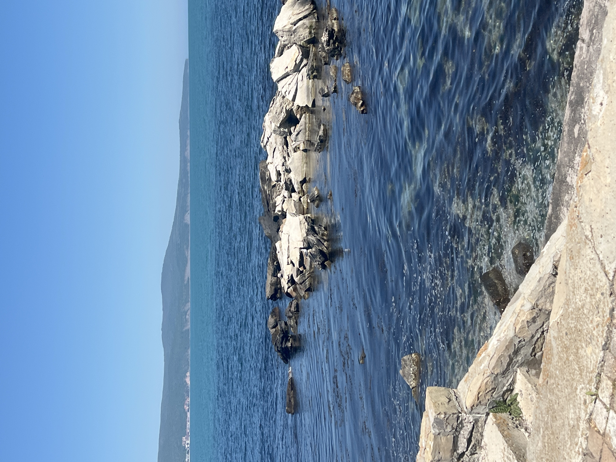 Tourist documents morning scenes in historic Nesebar, Bulgaria coastline