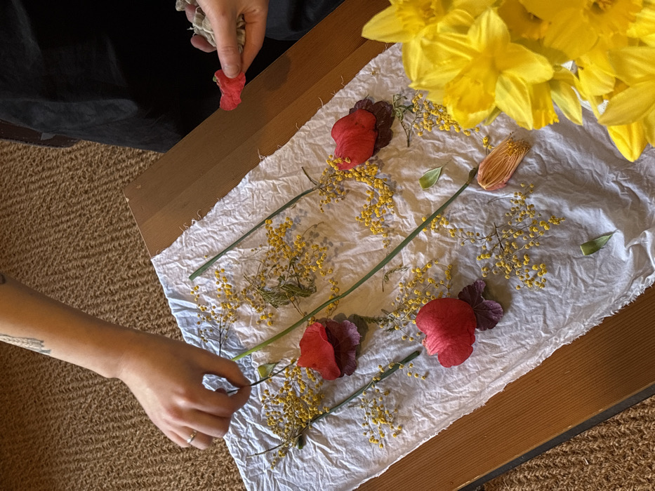 Floral craft activities documented in London indoor setting