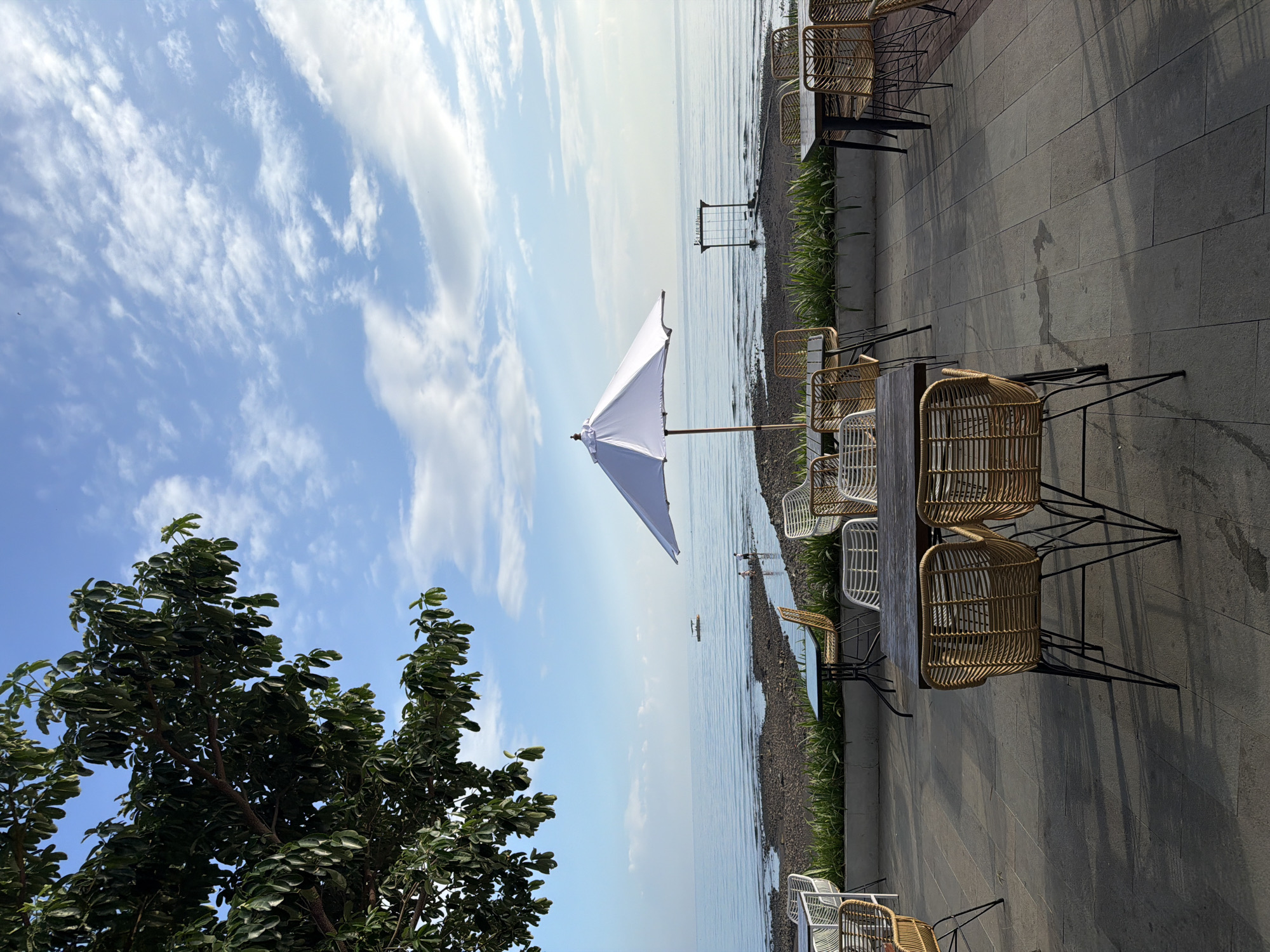 Coastal resort views and volcanic peaks at Pasir Putih, East Java