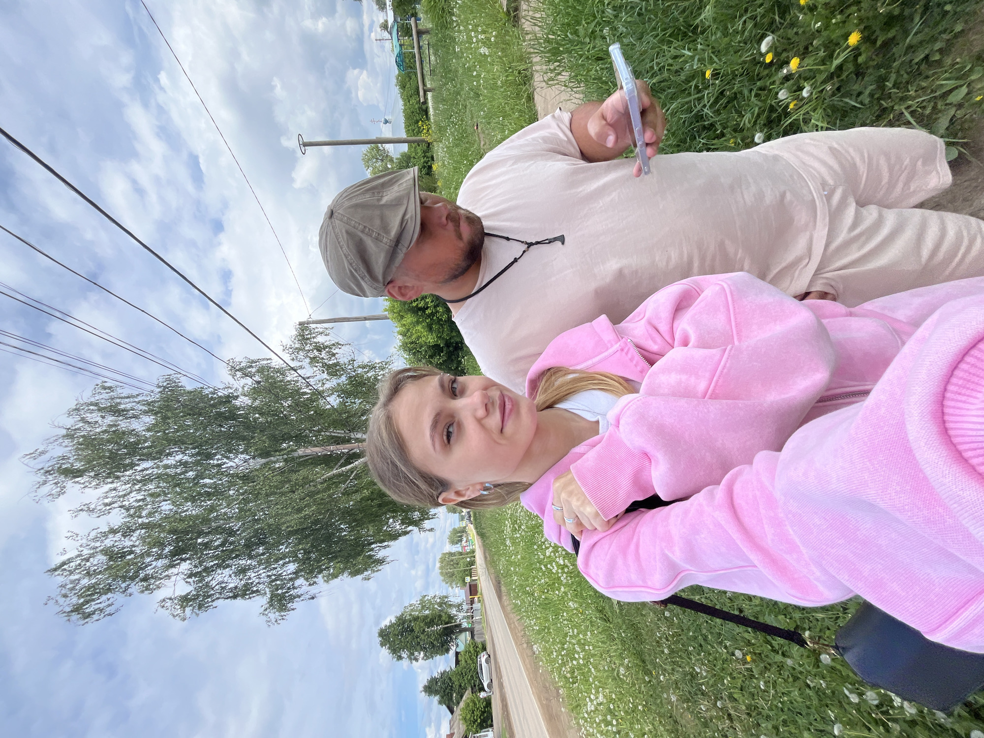 Couple takes selfies outdoors in Фоки, Russia