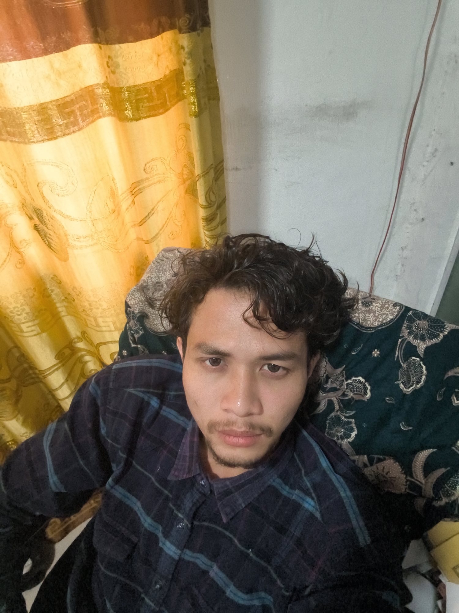 Goat pen life and casual selfies in rural Indonesia