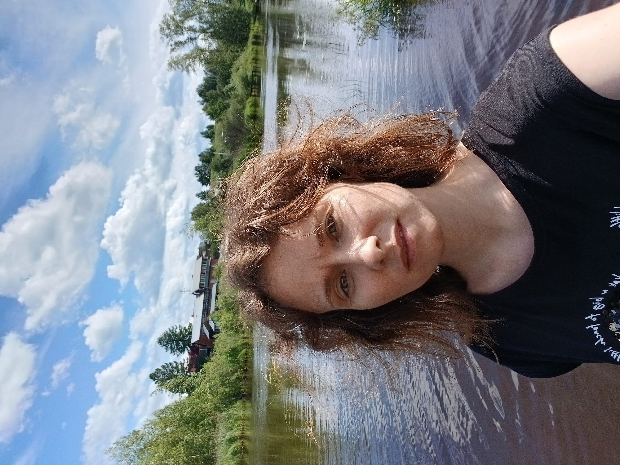 Calm riverside afternoon near Yekaterinburg on a clear summer day