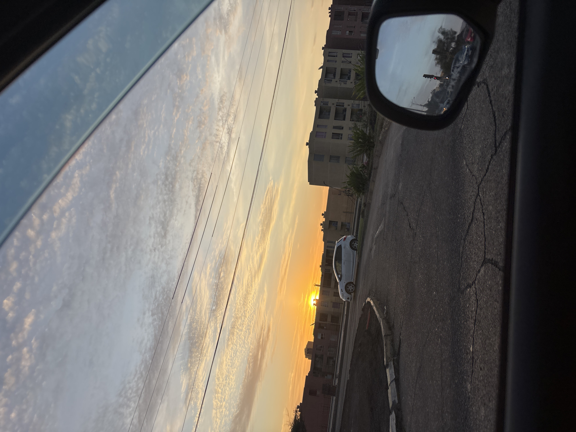 Sunset drive captured through car windows in Arica Chile