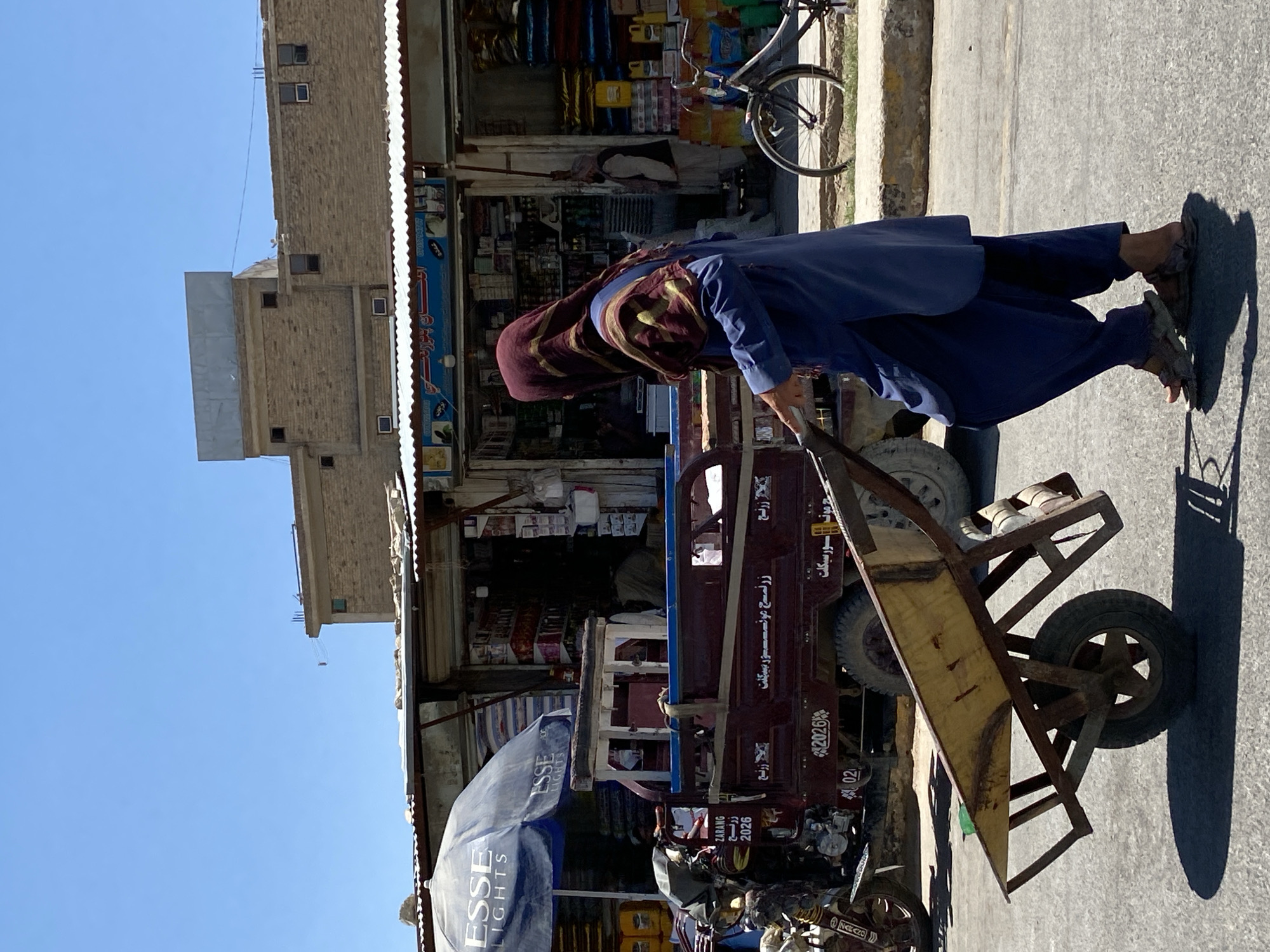 Morning street activity near a Kandahar market