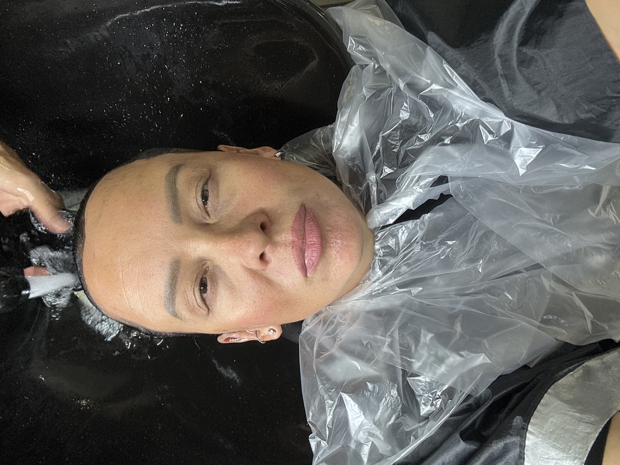 Woman documents hair salon visit in Chaikovsky, Russia