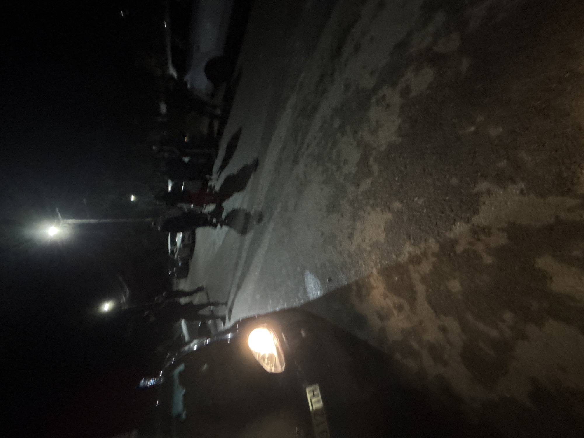 Car parked on street at night in Dabene, Bulgaria