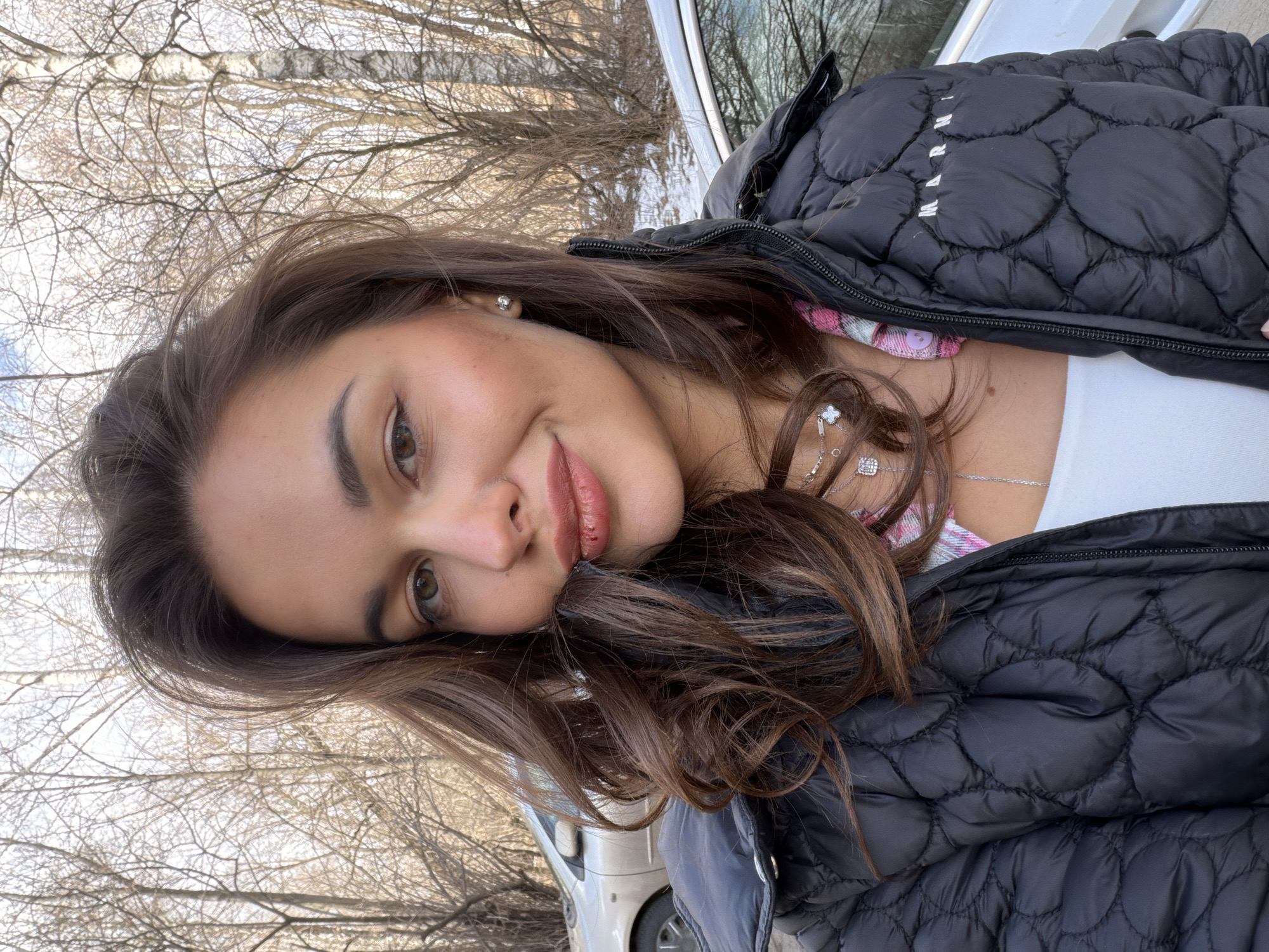 Woman photographed in casual outdoor portrait in Krasnoyarsk