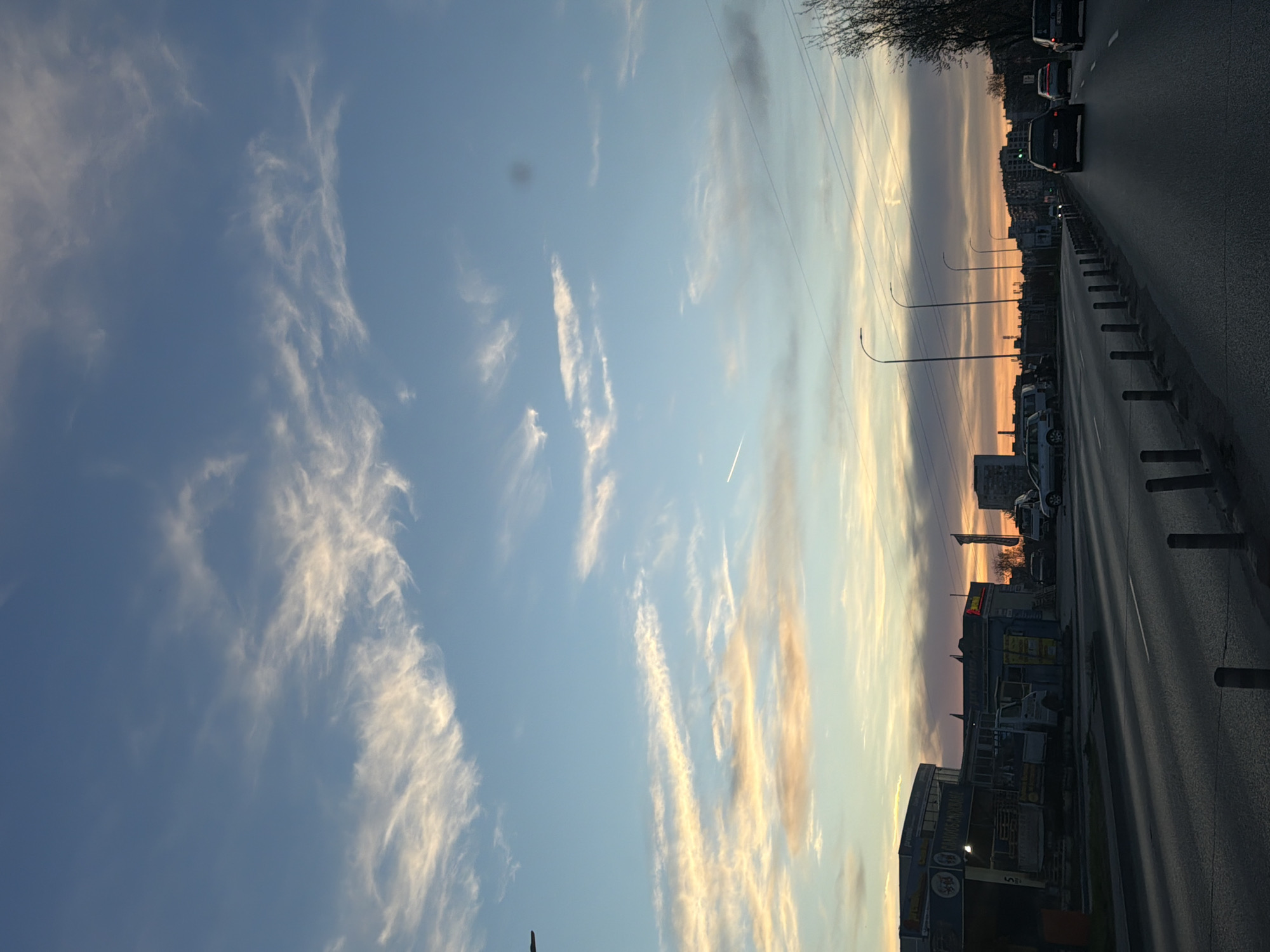 Vehicle captures cloudy sky view on Varna road