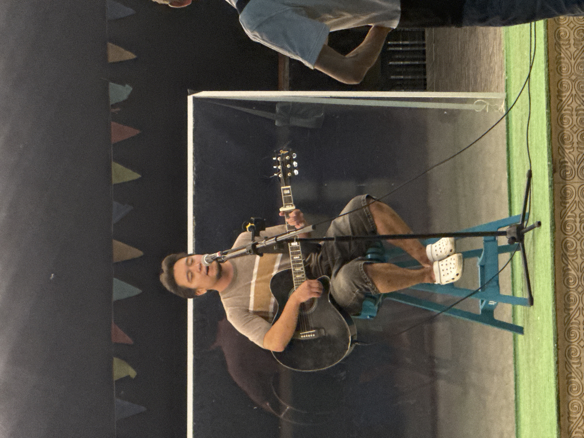 Live acoustic street performance at Pavlodar waterfront promenade