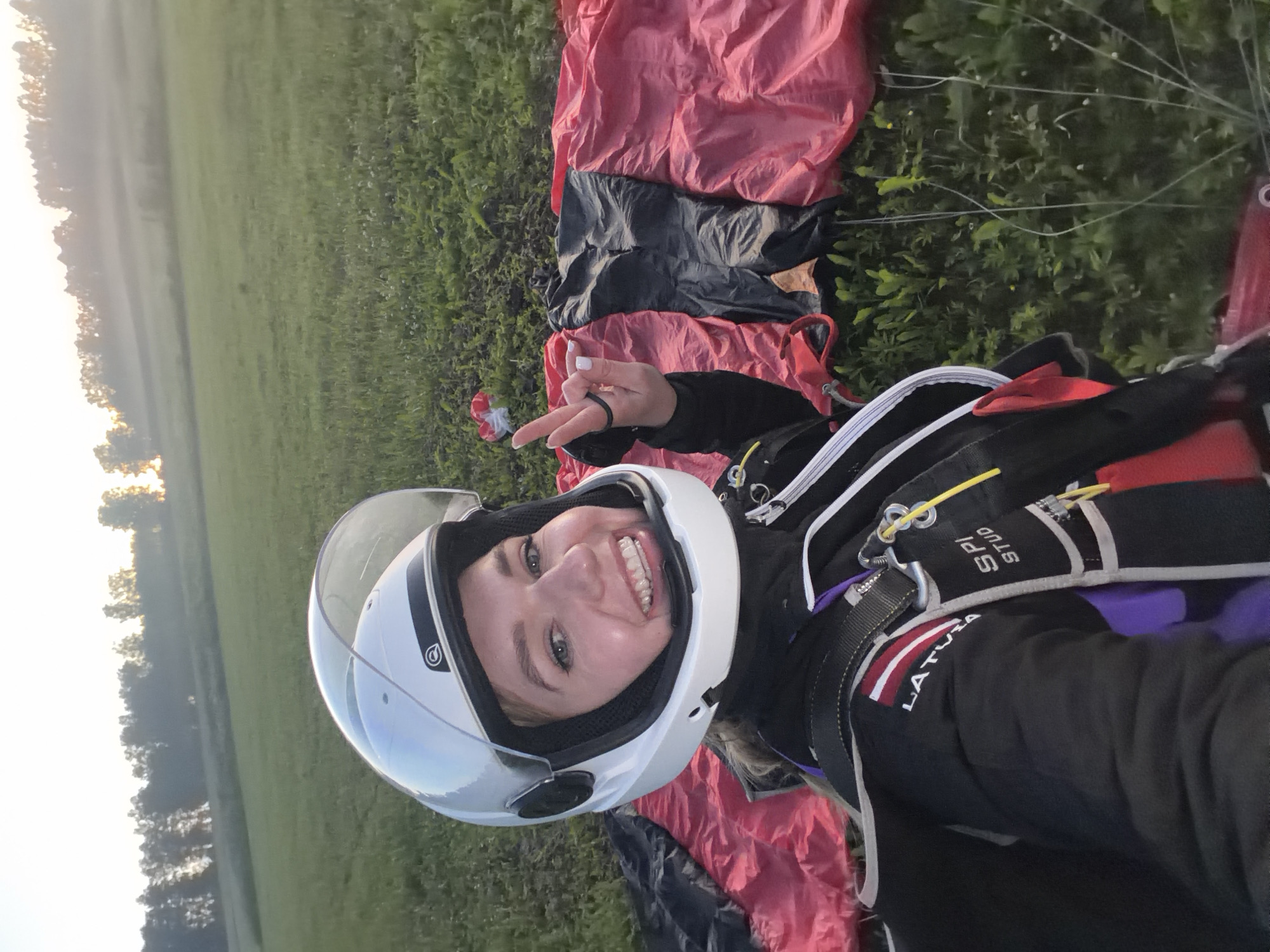Post-landing moments in a Latvian field after a skydive