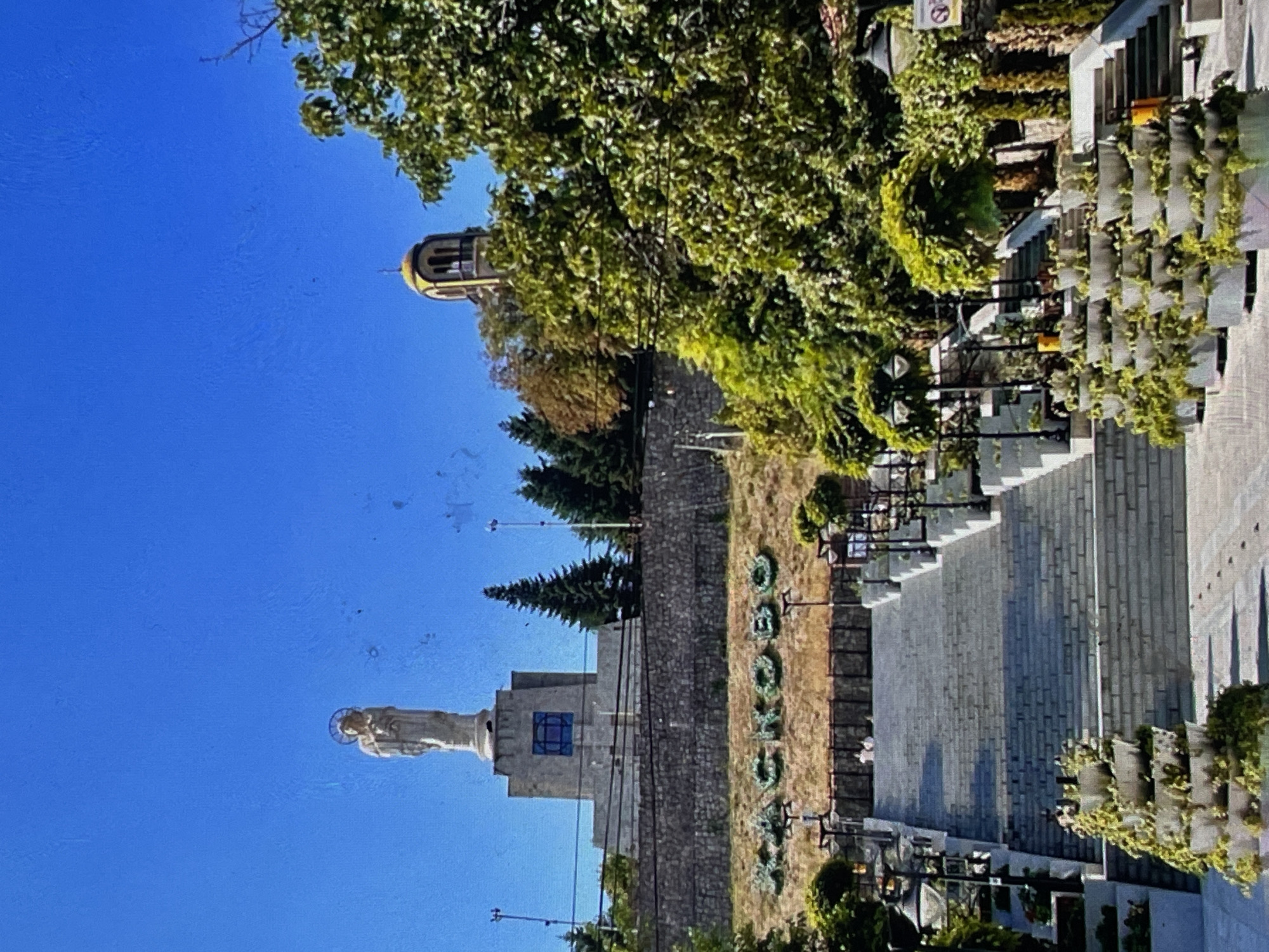 Monuments, bell tower, and horses around Harmanli, Bulgaria