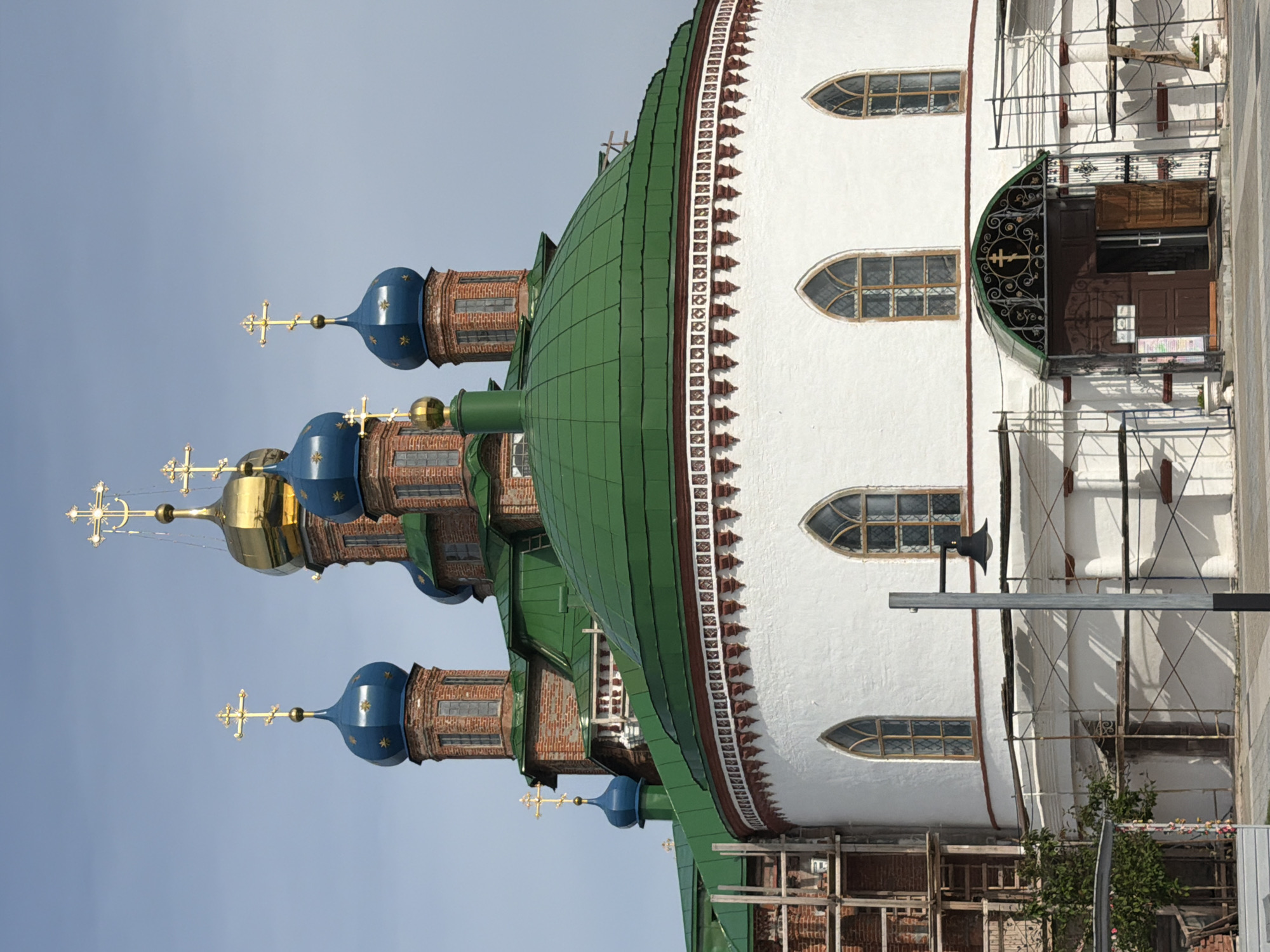 Visiting a historic church in Usolye, ice cream in hand