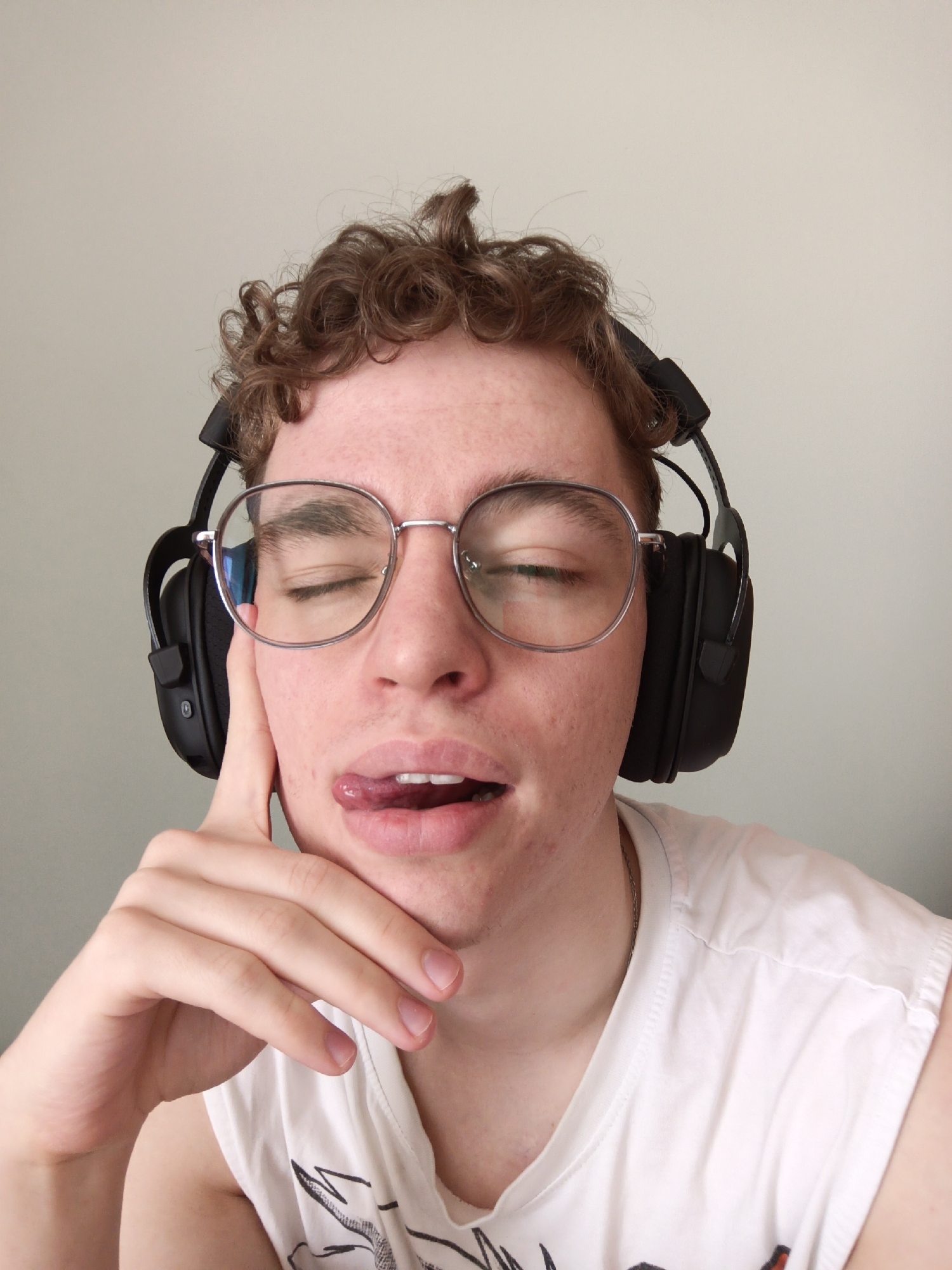 Young man takes headphone selfies in Odintsovo, Russia