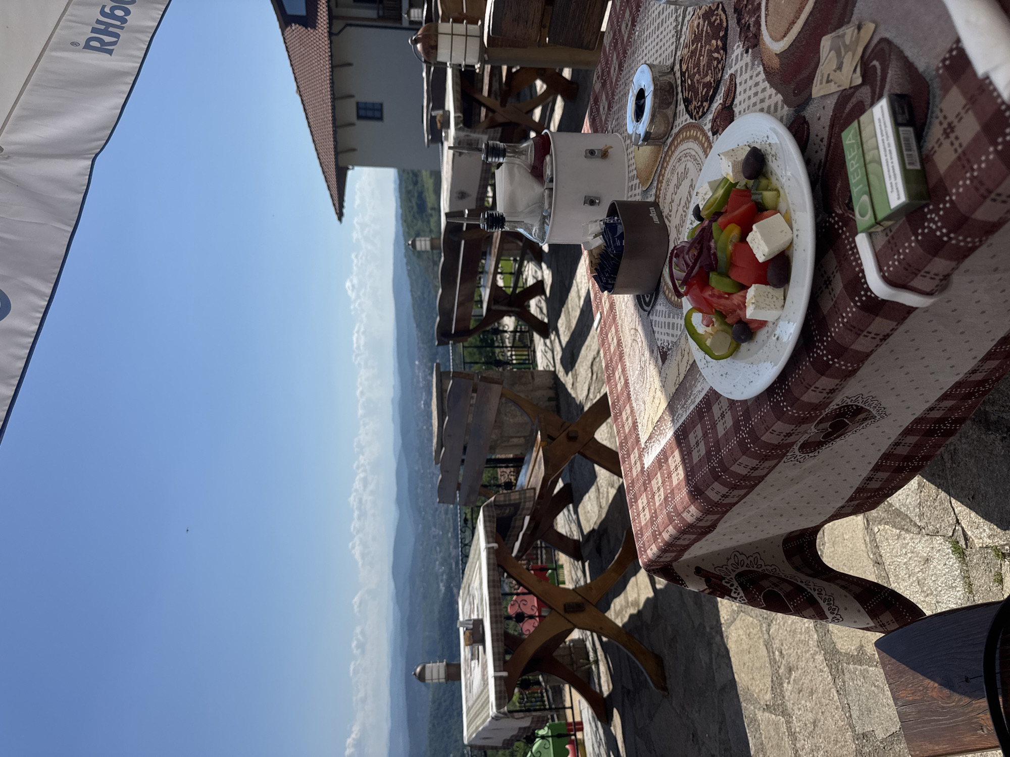 Afternoon coffee break captured at Arbanassi outdoor cafe