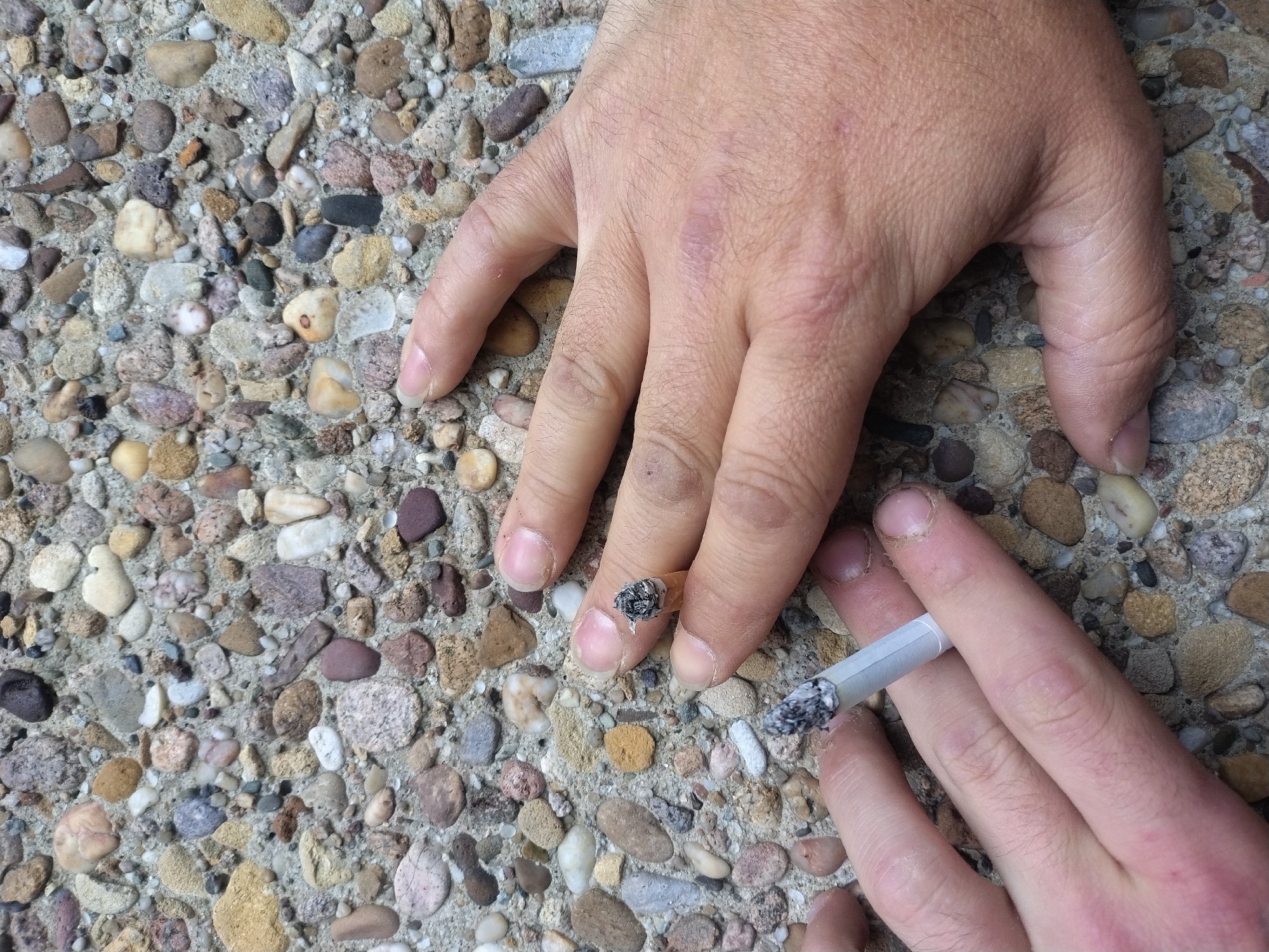 Black liquid spill documented on concrete in Leudelange