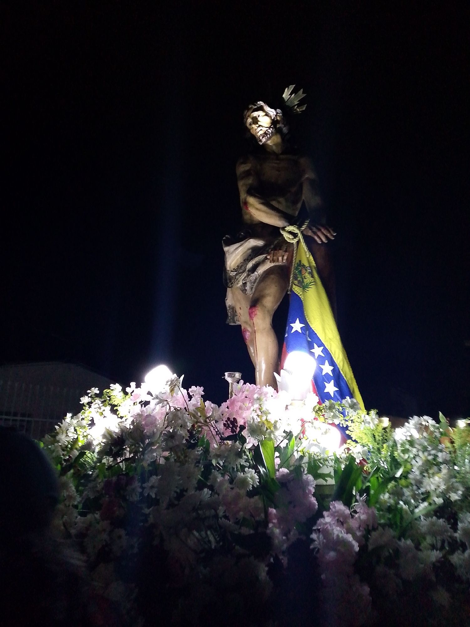 Religious procession with Jesus statue in Tinaquillo, Venezuela