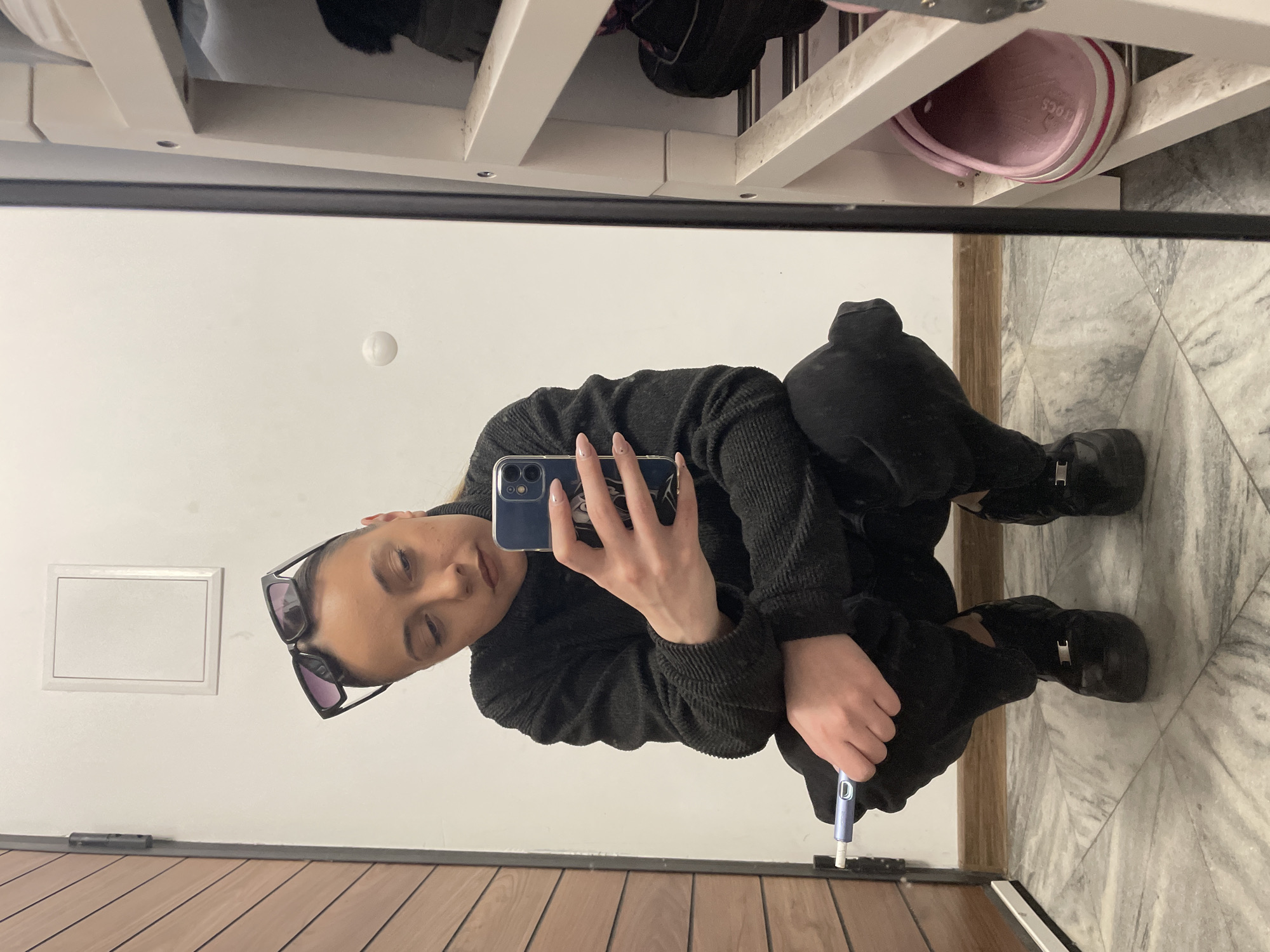 Person takes mirror selfie indoors in Sofia