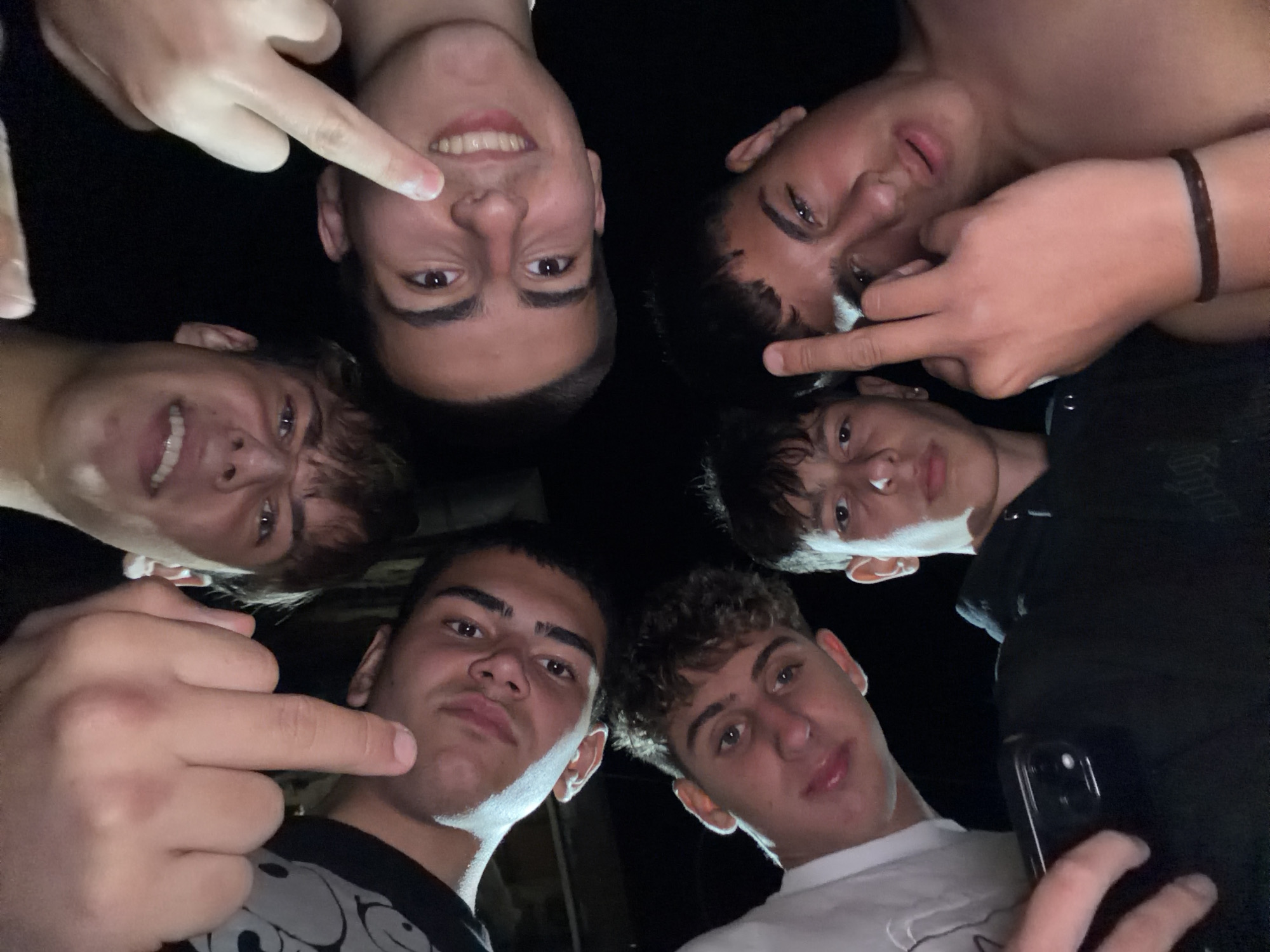 Young men gather for evening social activities in Novi Iskar