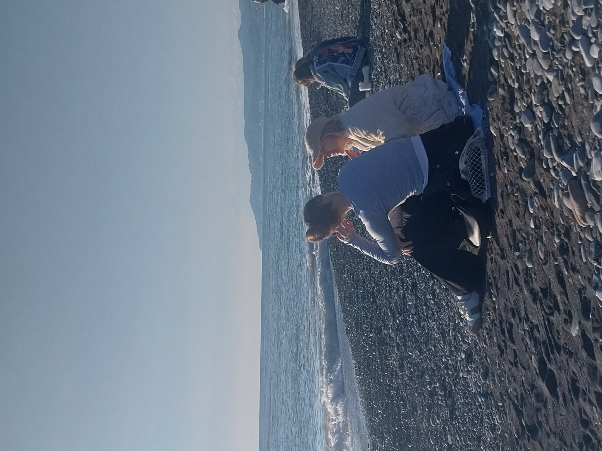 Beachgoers enjoy sunny afternoon activities along Sochi coastline